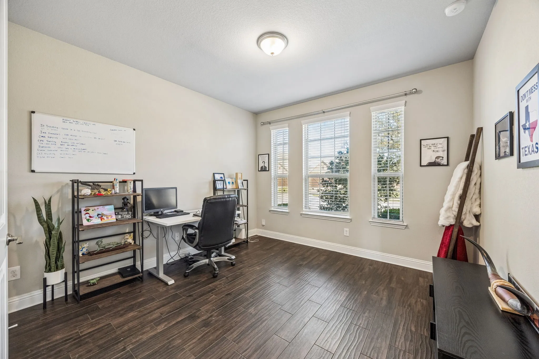 Guest bedroom currently being utilized as an additional office.