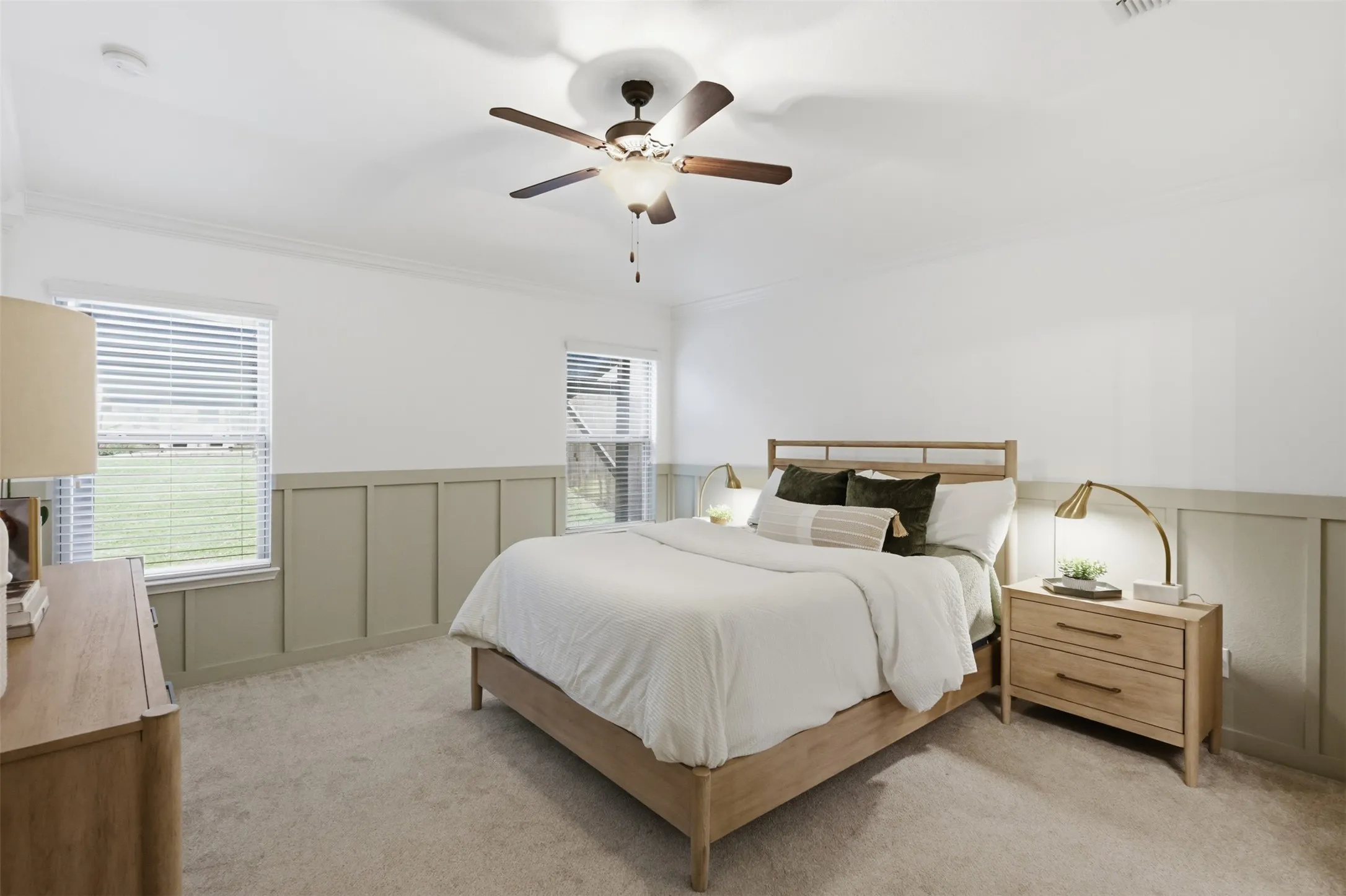 Primary bedroom updates include custom board and batten walls with designer color scheme