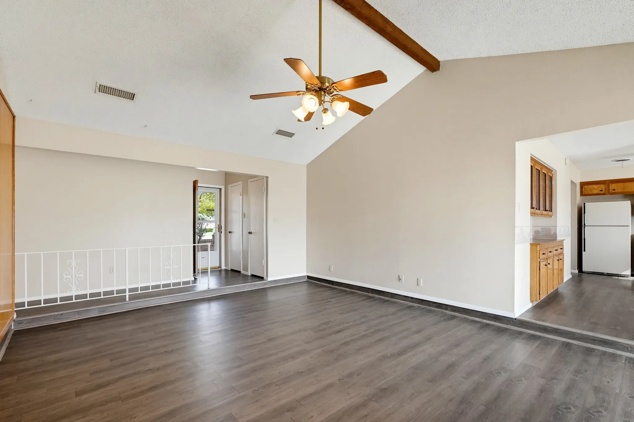 Wide open for sofas, game nights, and holiday crowds, with handy closets by the door.