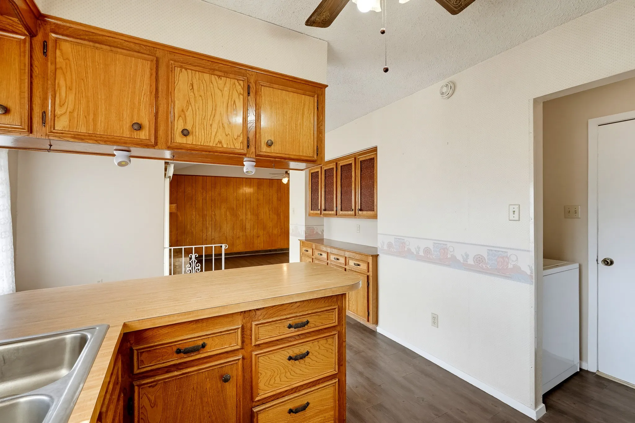 Extra cabinet space for the pantry overflow and the good platters.