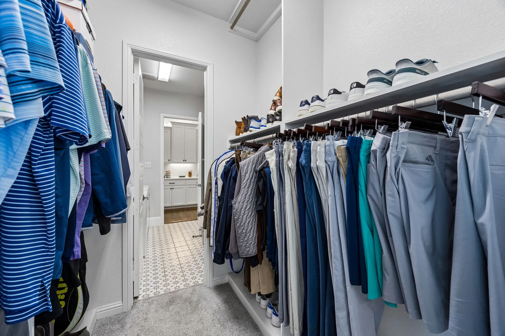 Pass through from the primary bath through a closet to the laundry!