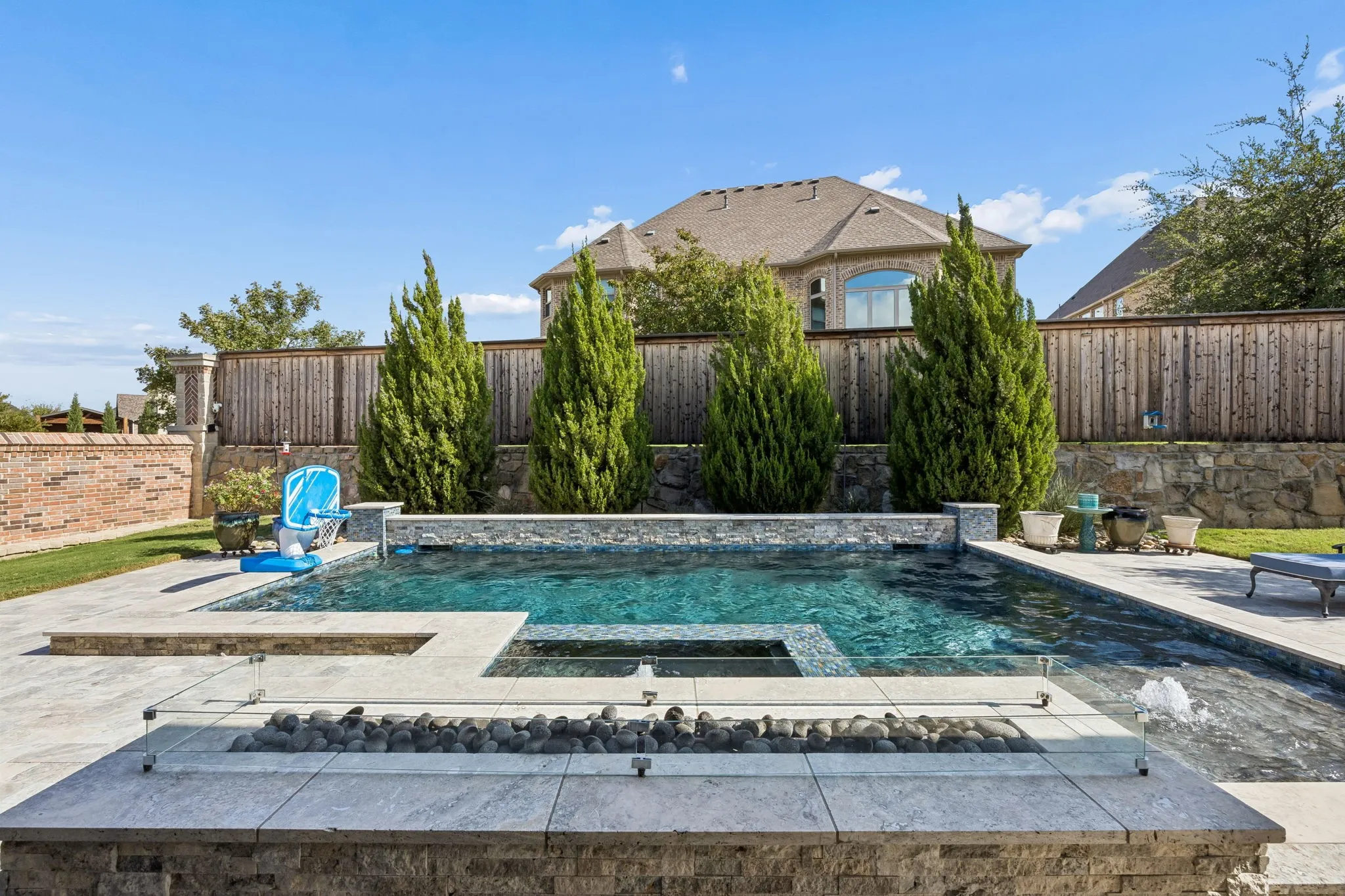 Fire pit directly in front of the pool