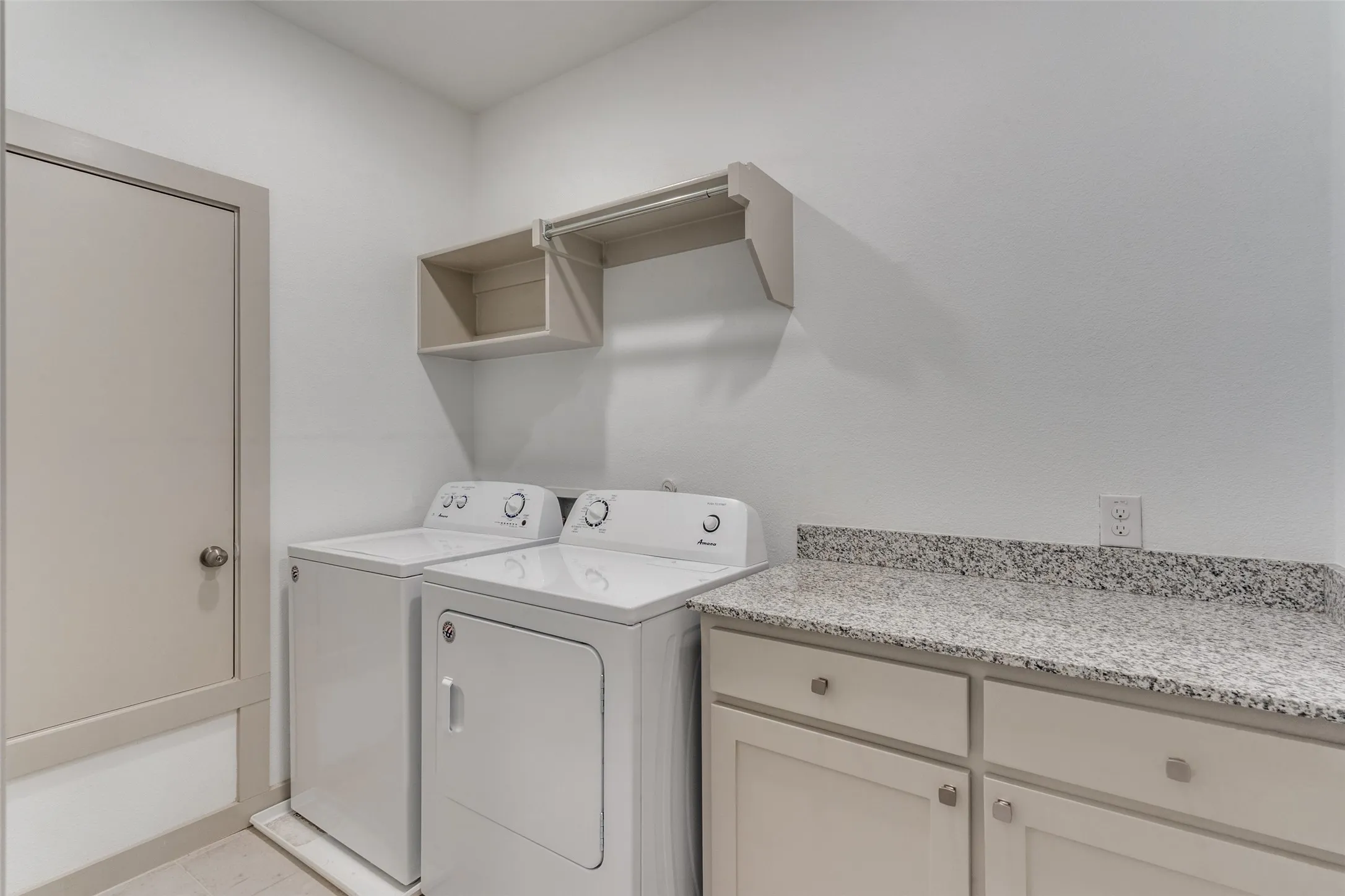 Full size laundry and cabinets, folding counter