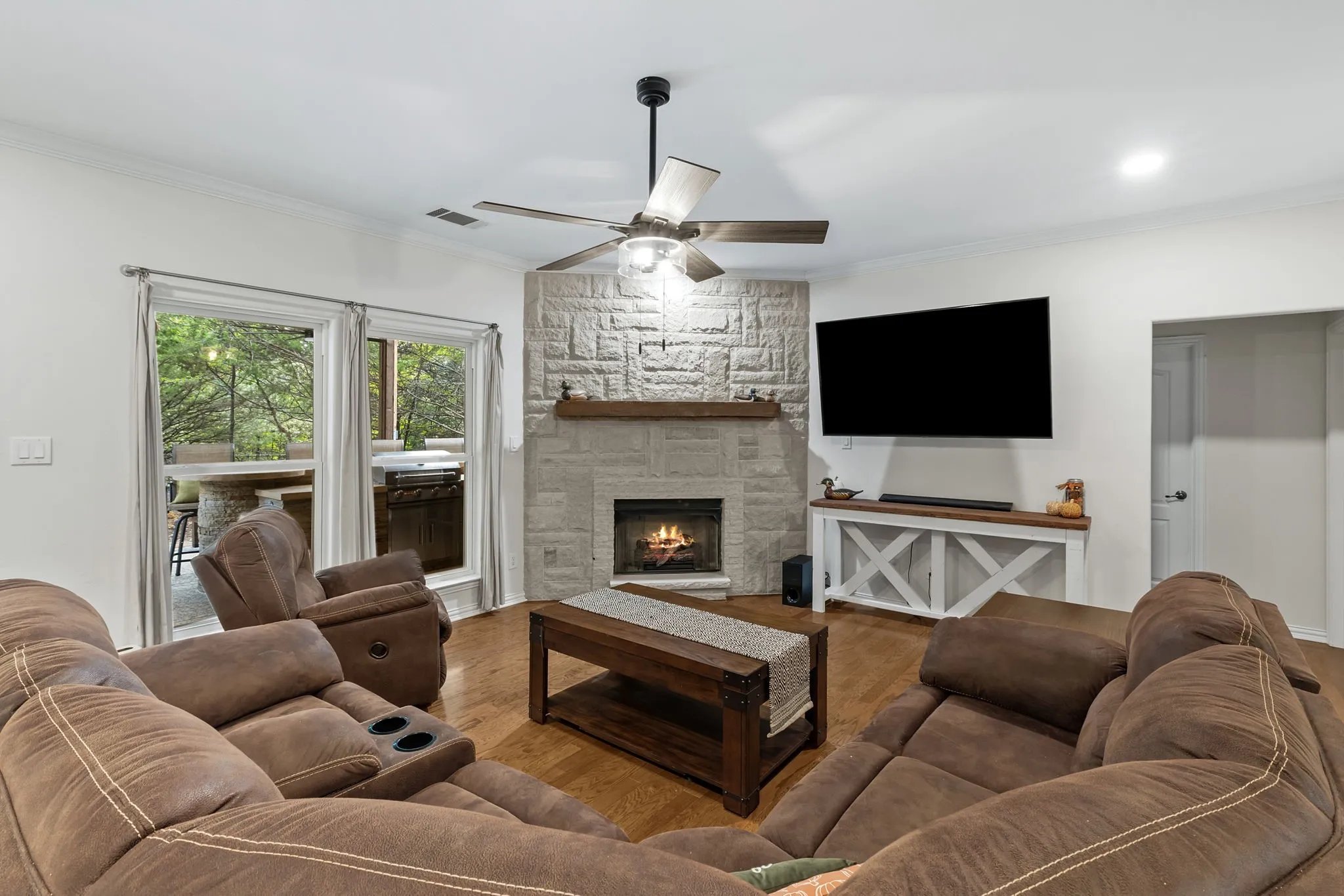 Cozy living room with backyard views