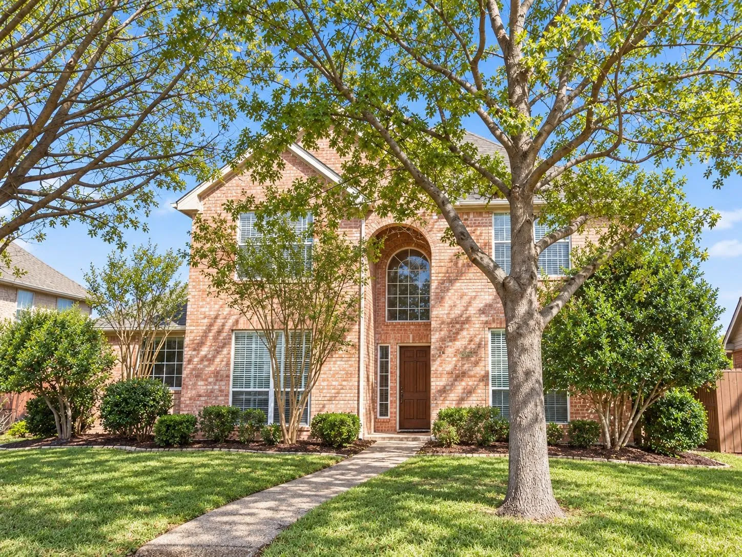 View of home from sidewalk.