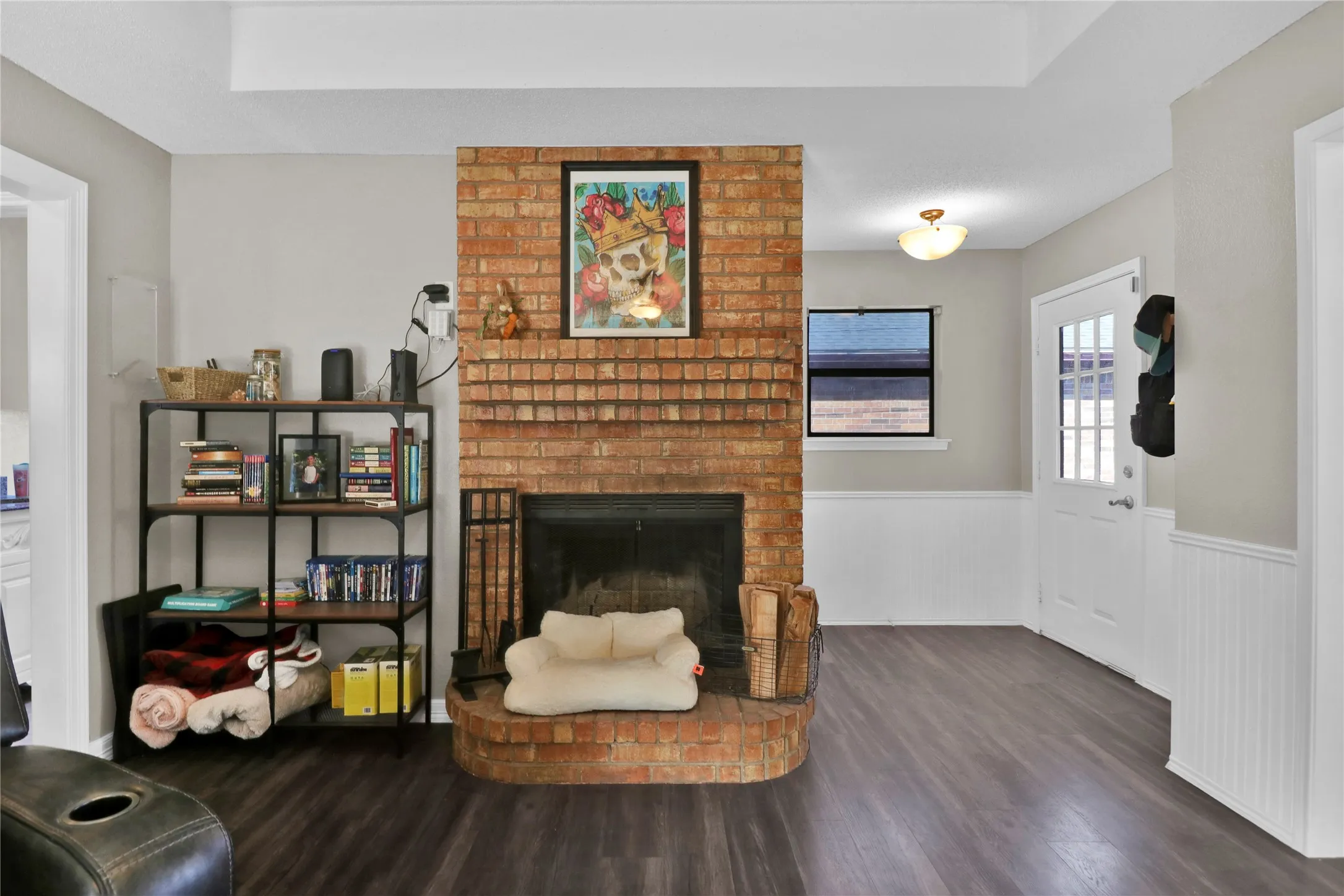 Brick wood burning fireplace for cozy winter nights.