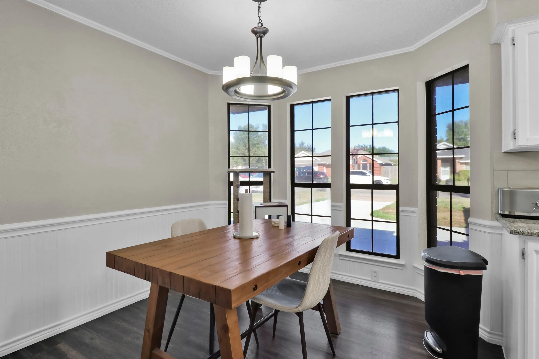 Dining room. You can see out the windows but the solar screens block the view inside.