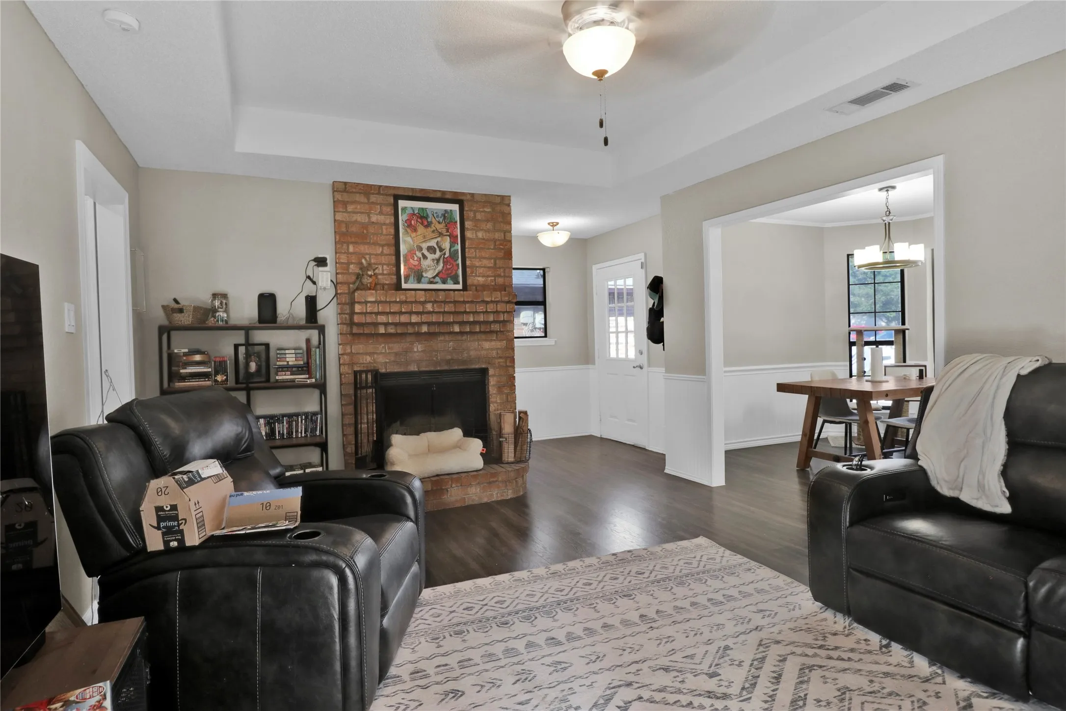 Living room opens to dining space and kitchen.