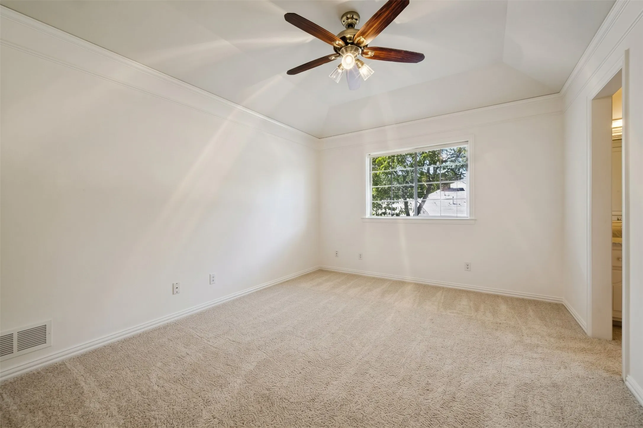 One of two second floor bedrooms
