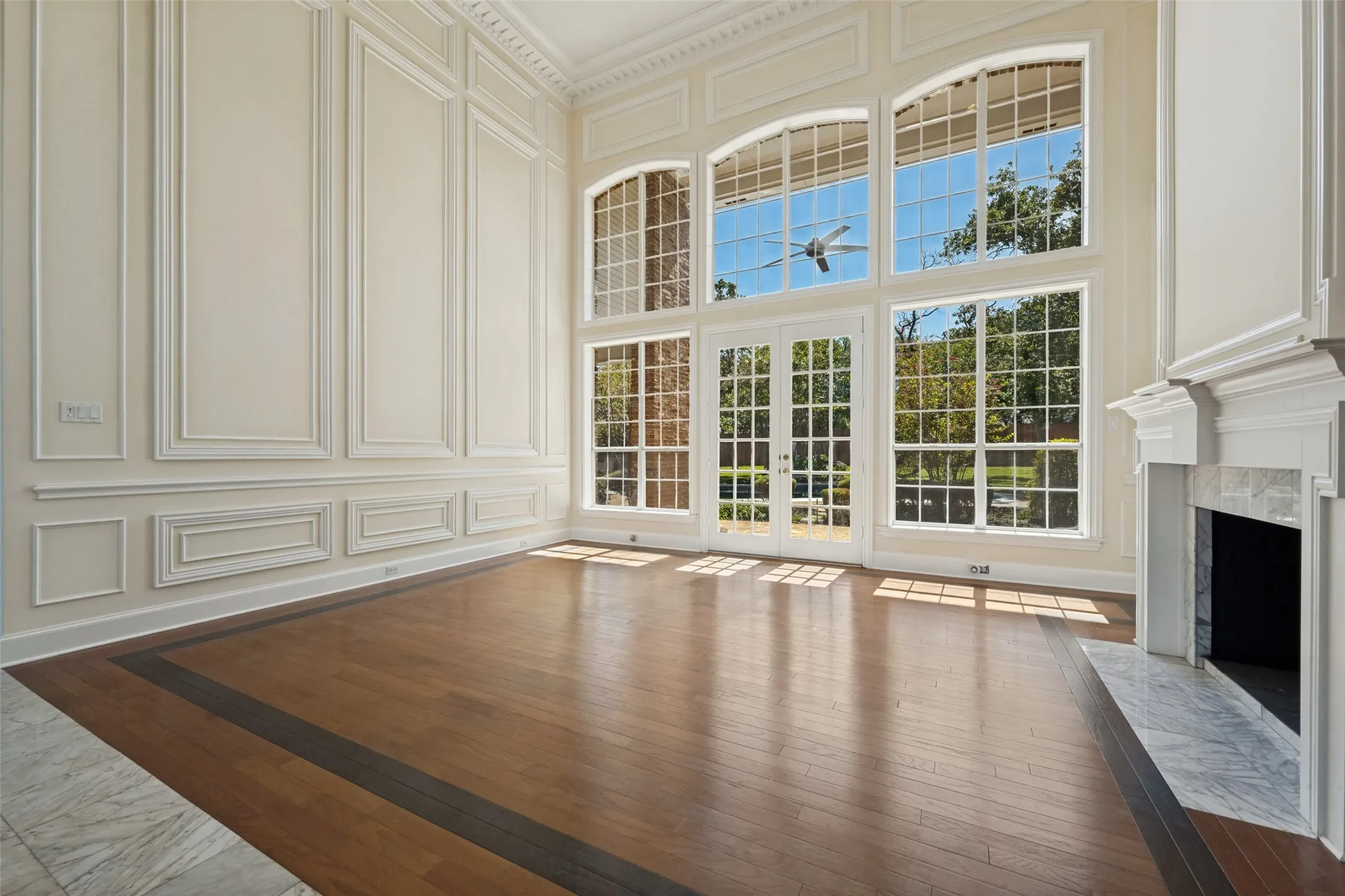 Formal living room with tons of natural light