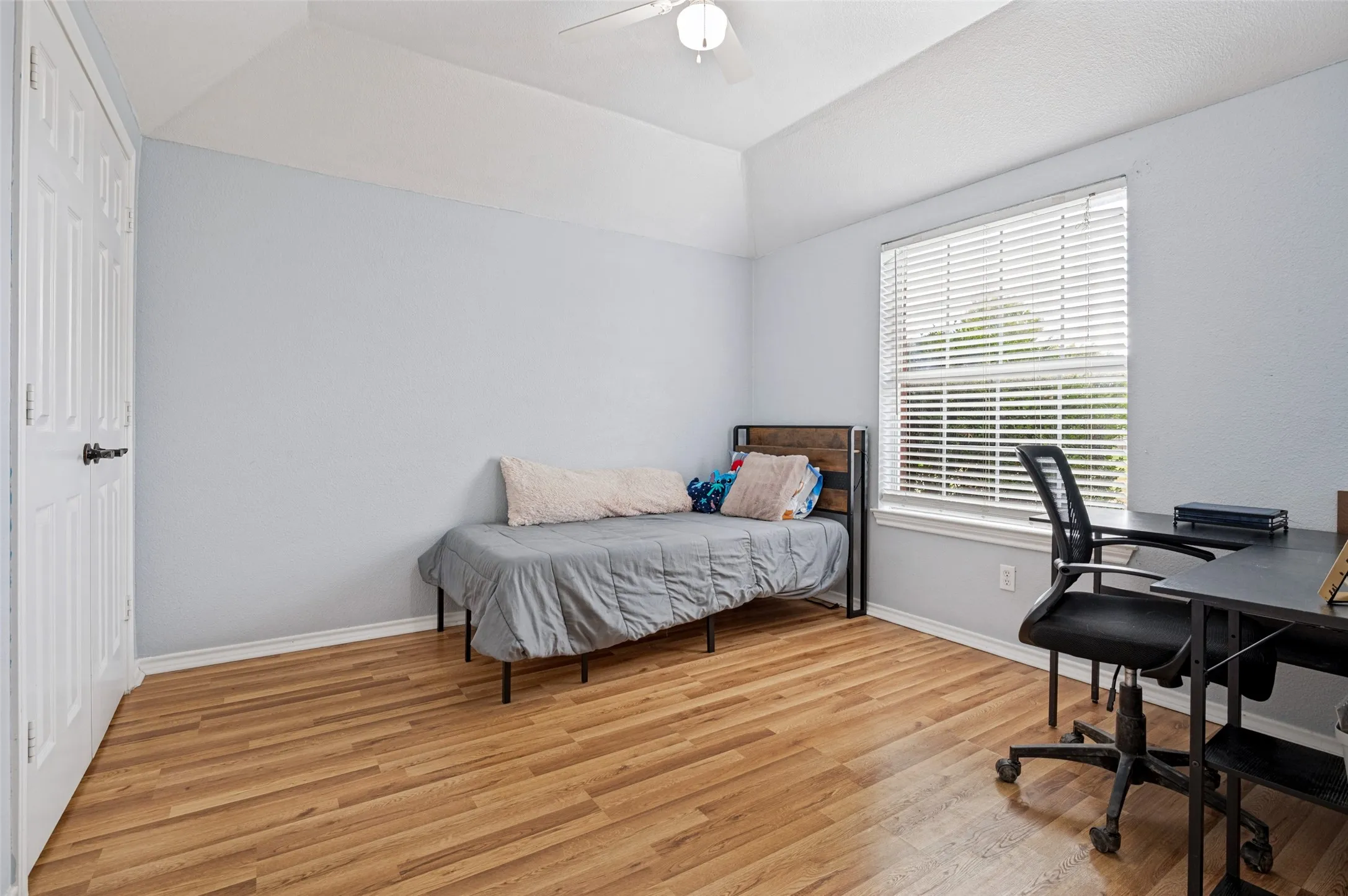 Additional secondary bedroom offers comfortable, versatile spaces with plenty of potential for family or guests.