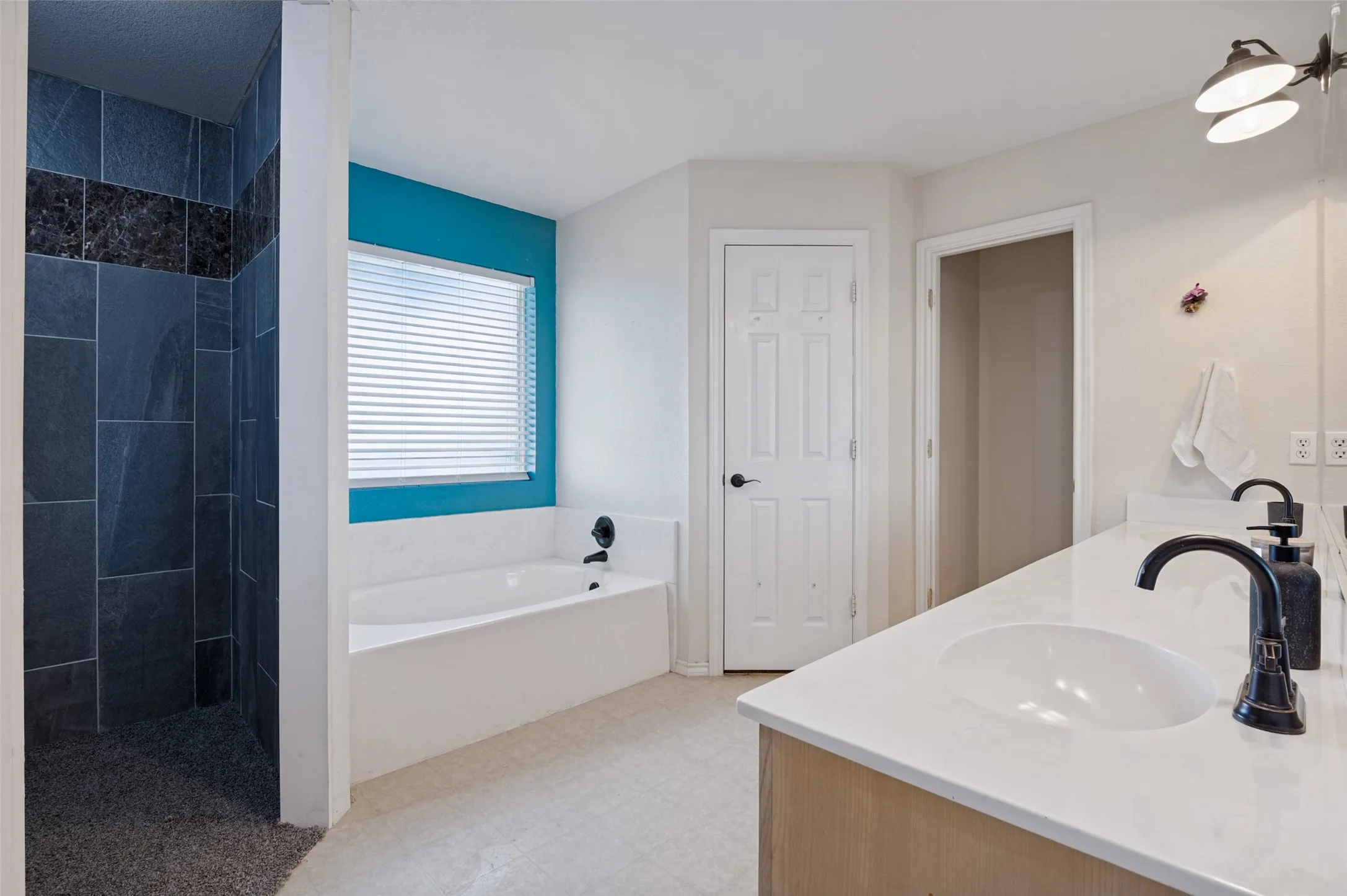 Unwind and relax in the garden tub, the perfect spot to enjoy a peaceful soak and a little everyday luxury.