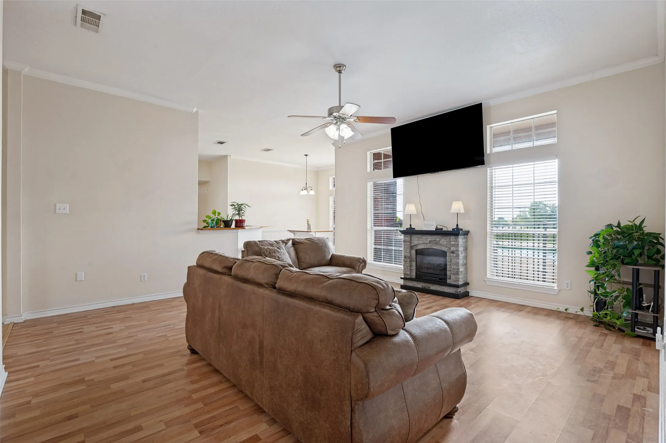 Enjoy beautiful views of the pool from the living area, creating a seamless connection to the outdoors and adding to the home’s inviting country charm.