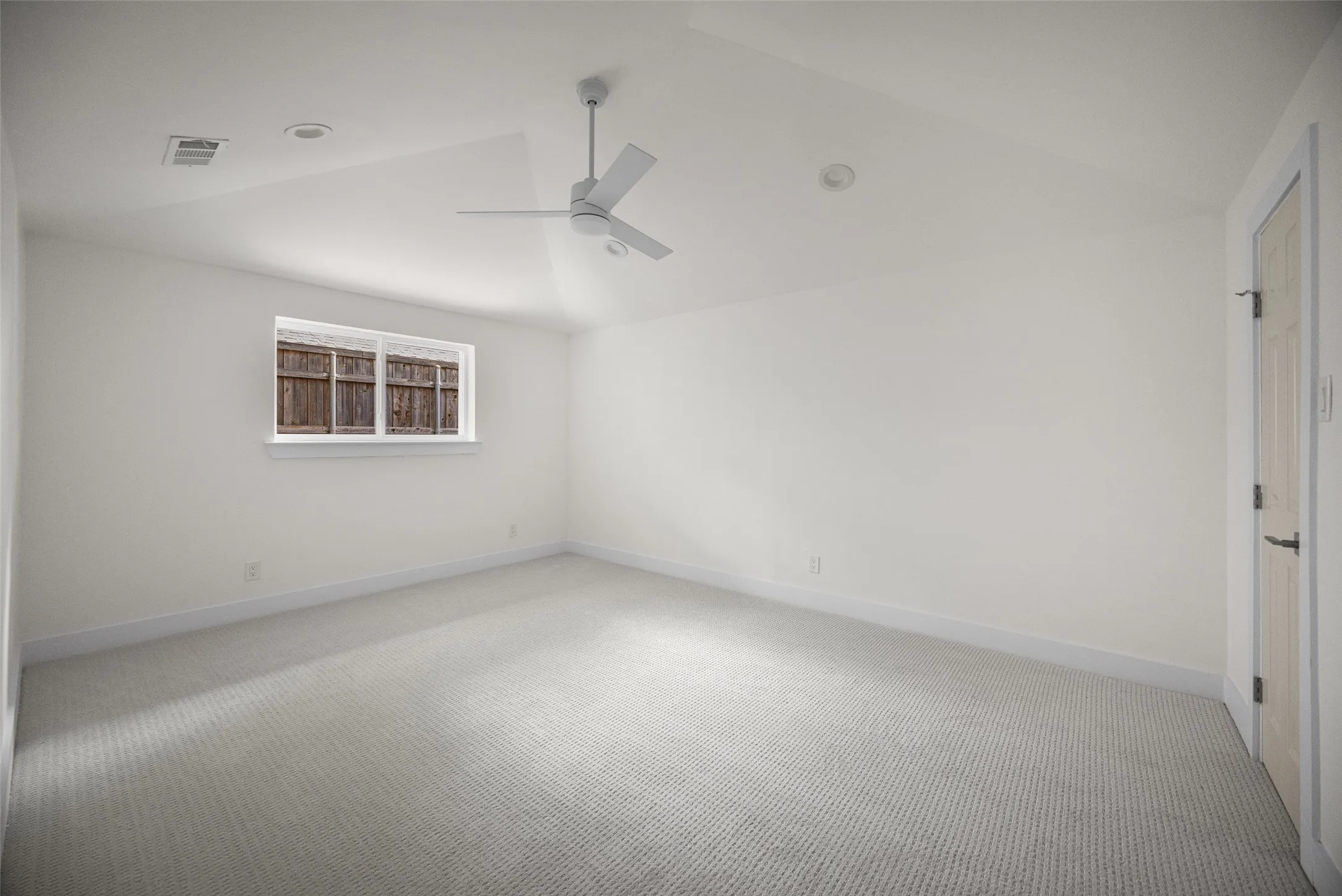 Large secondary bedroom, that is large enough to be a playroom, office, etc.