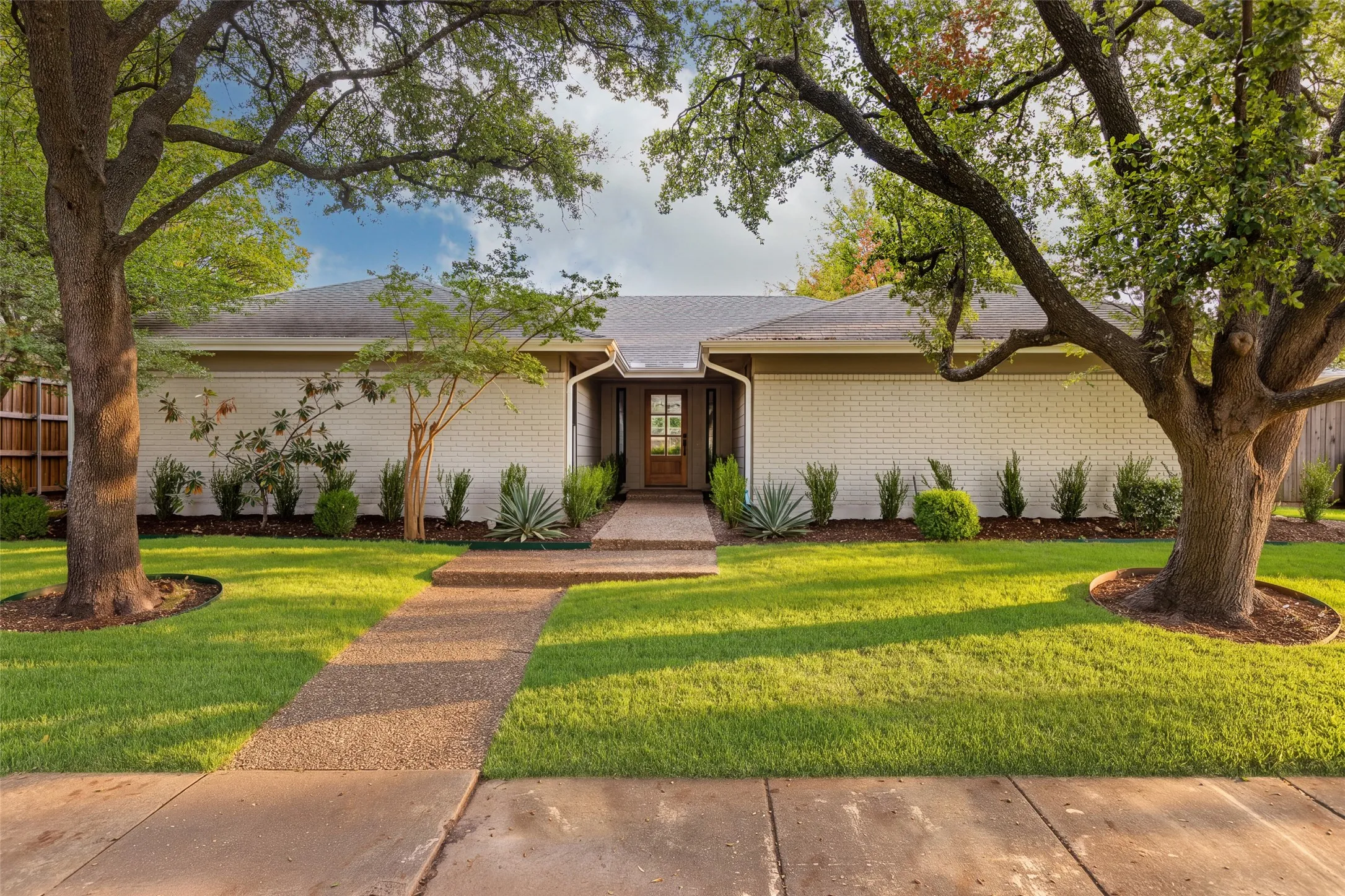 Beautifully updated traditional ranch-style home with timeless architectural charm and modern finishes