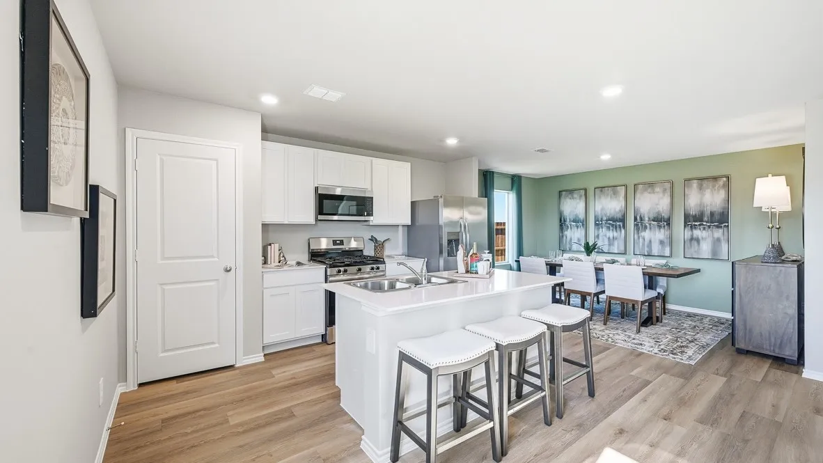 Kitchen-All Home and community information, including pricing, included features, terms, availability and amenities, are subject to change at any time without notice or obligation. All Drawings, pictures, photographs, video, square footages, floor plans, elevations, features, colors and sizes are approximate for illustration purposes only and will vary from the homes as built.