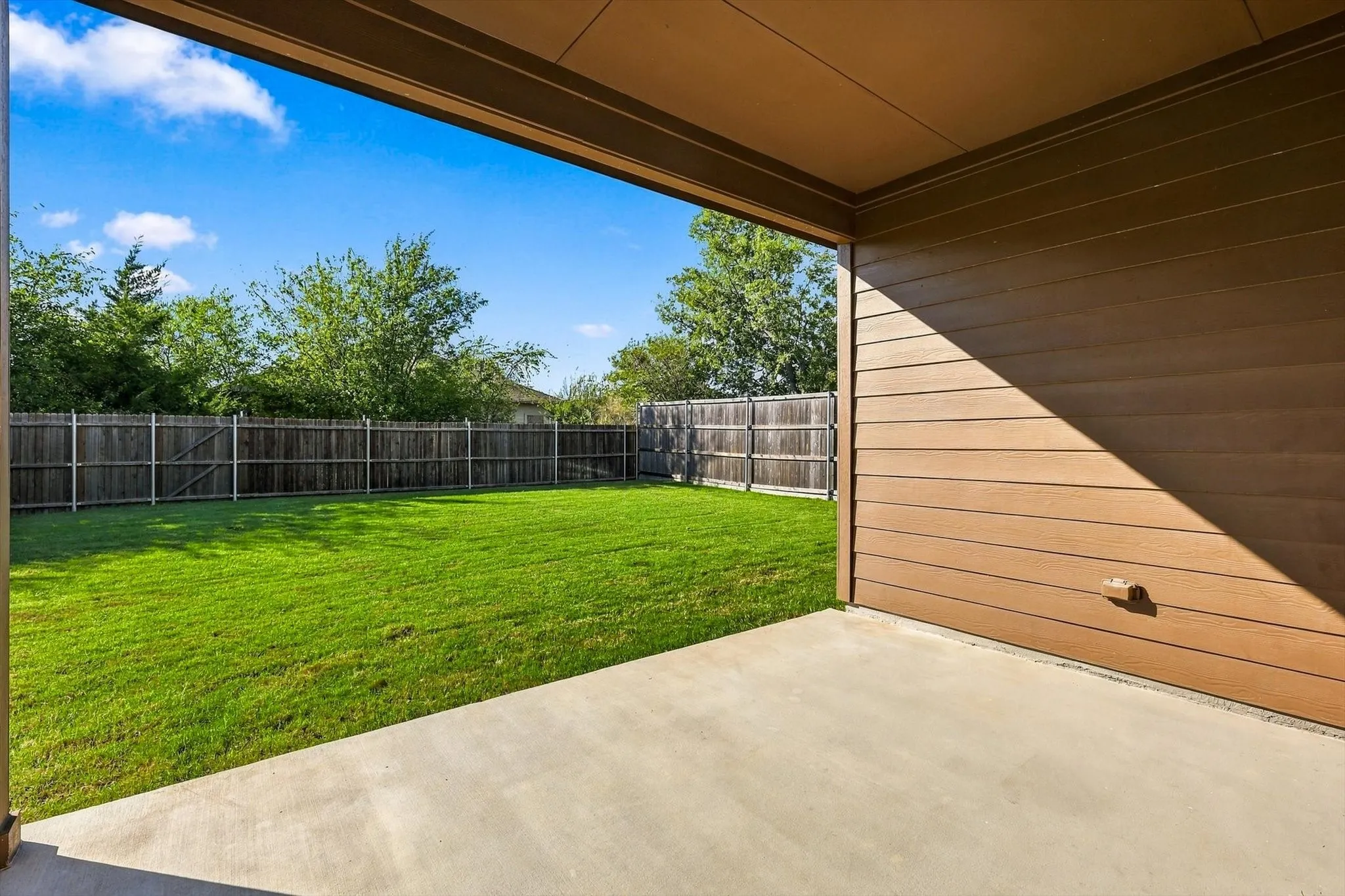 spacious covered patio allows you to enjoy the outdoors rain or shine.