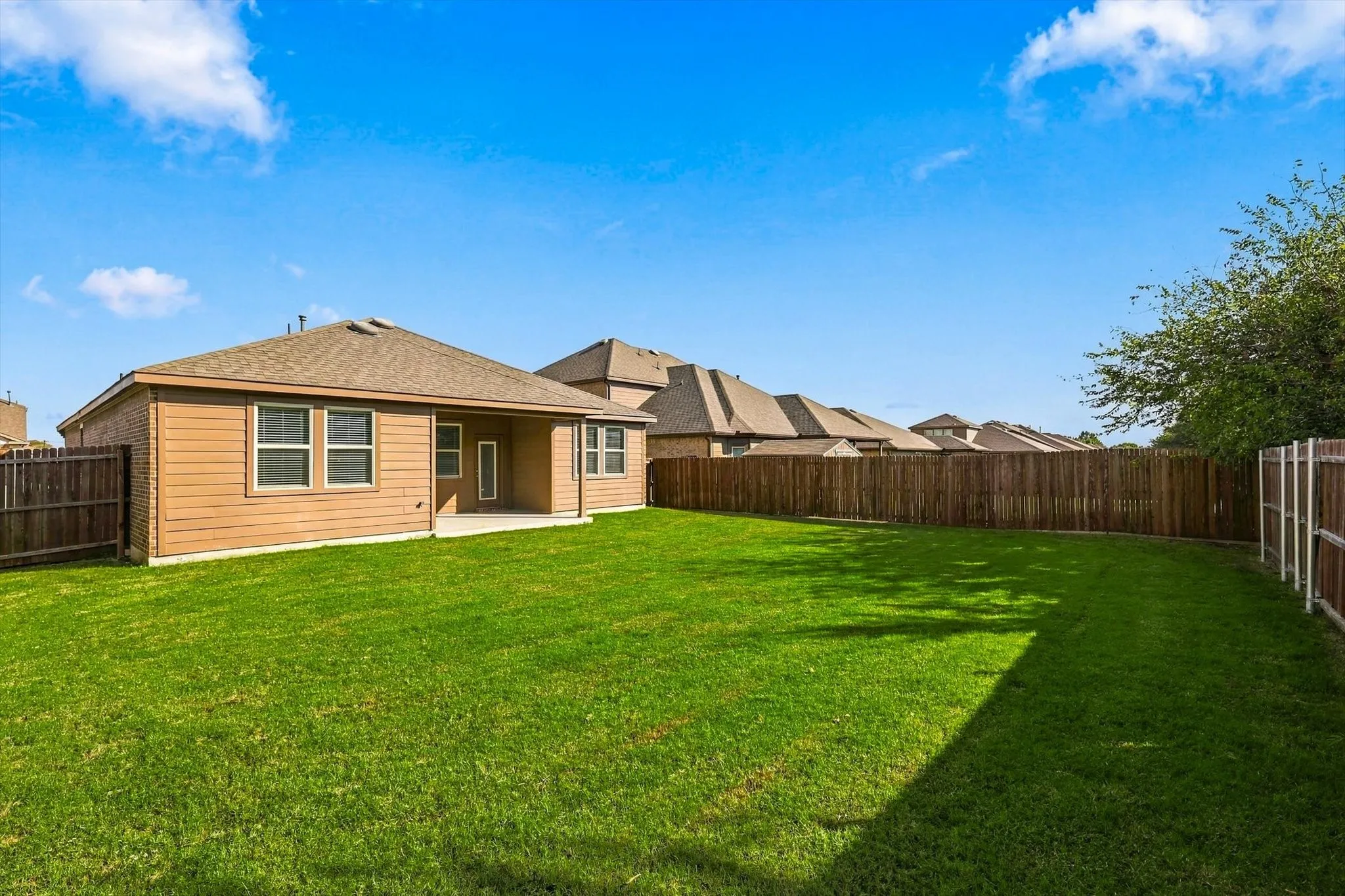 Good size yard.  Plenty of room for fun and games.