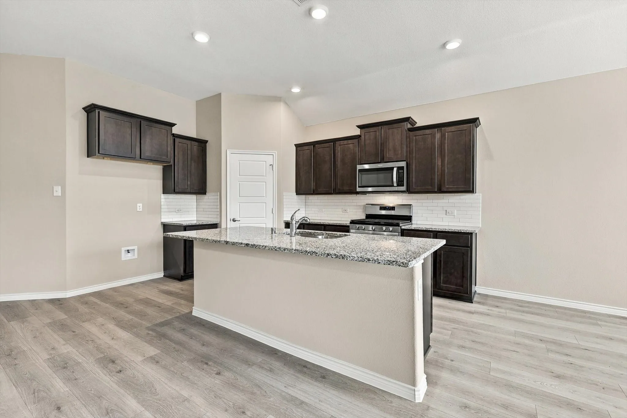 Large island and Walk in pantry make this a very workable kitchen.