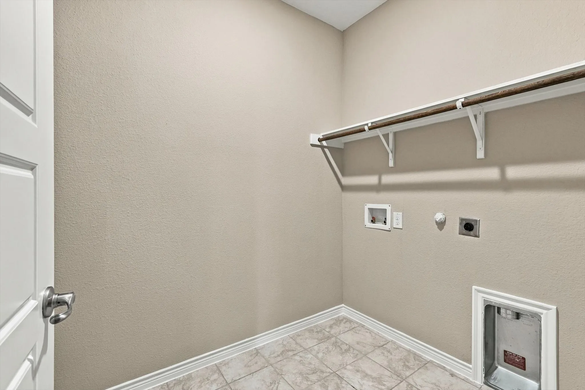 laundry room will hold a full size washer and dryer.