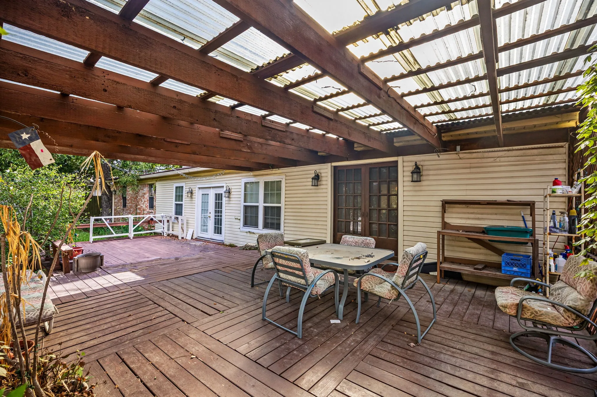 Outdoor deck w partial covered pergola