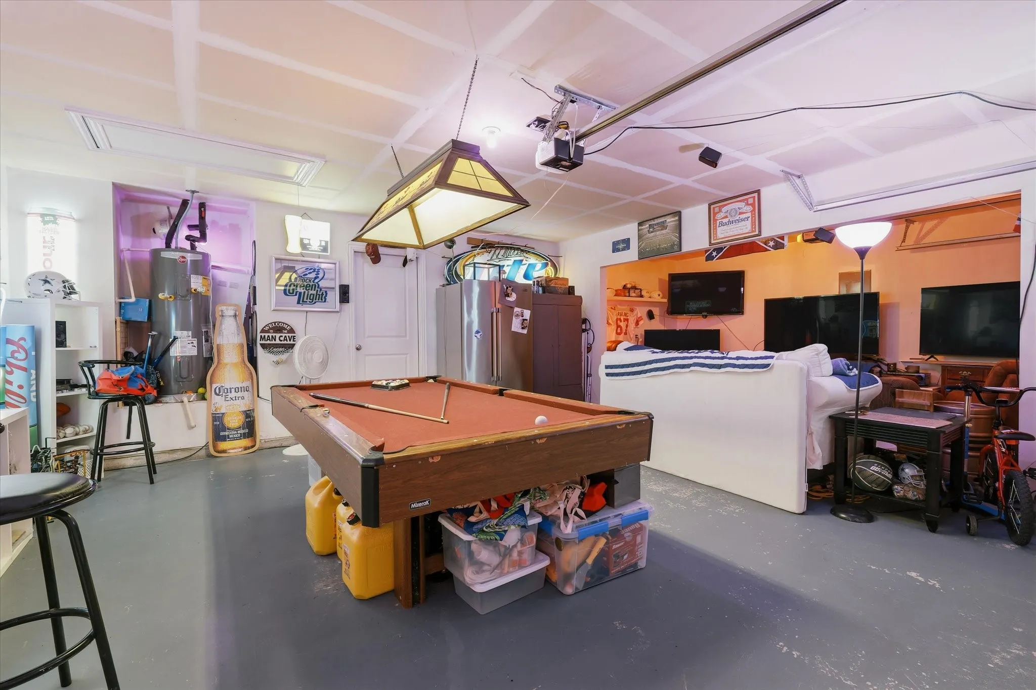 3 car garage is currently utilized for entertainment space.