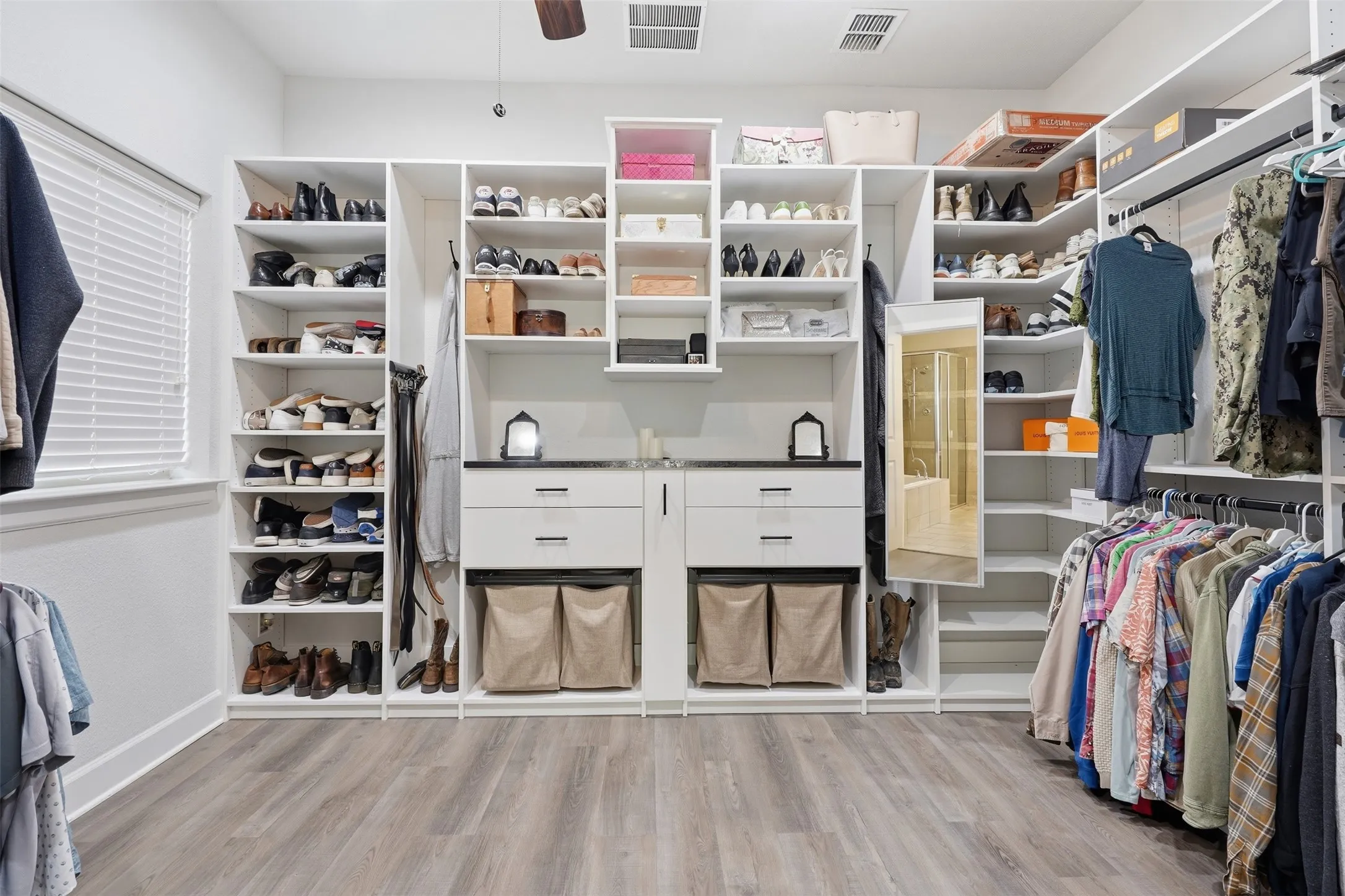 CUSTOM DREAM CLOSET! All the custom pull outs and hidden features you would want and more!