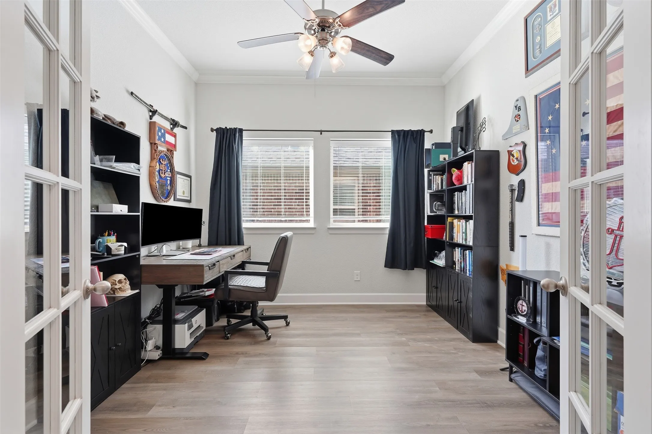 Room featuring double French entry doors. Can be used as home office, formal dining or play room