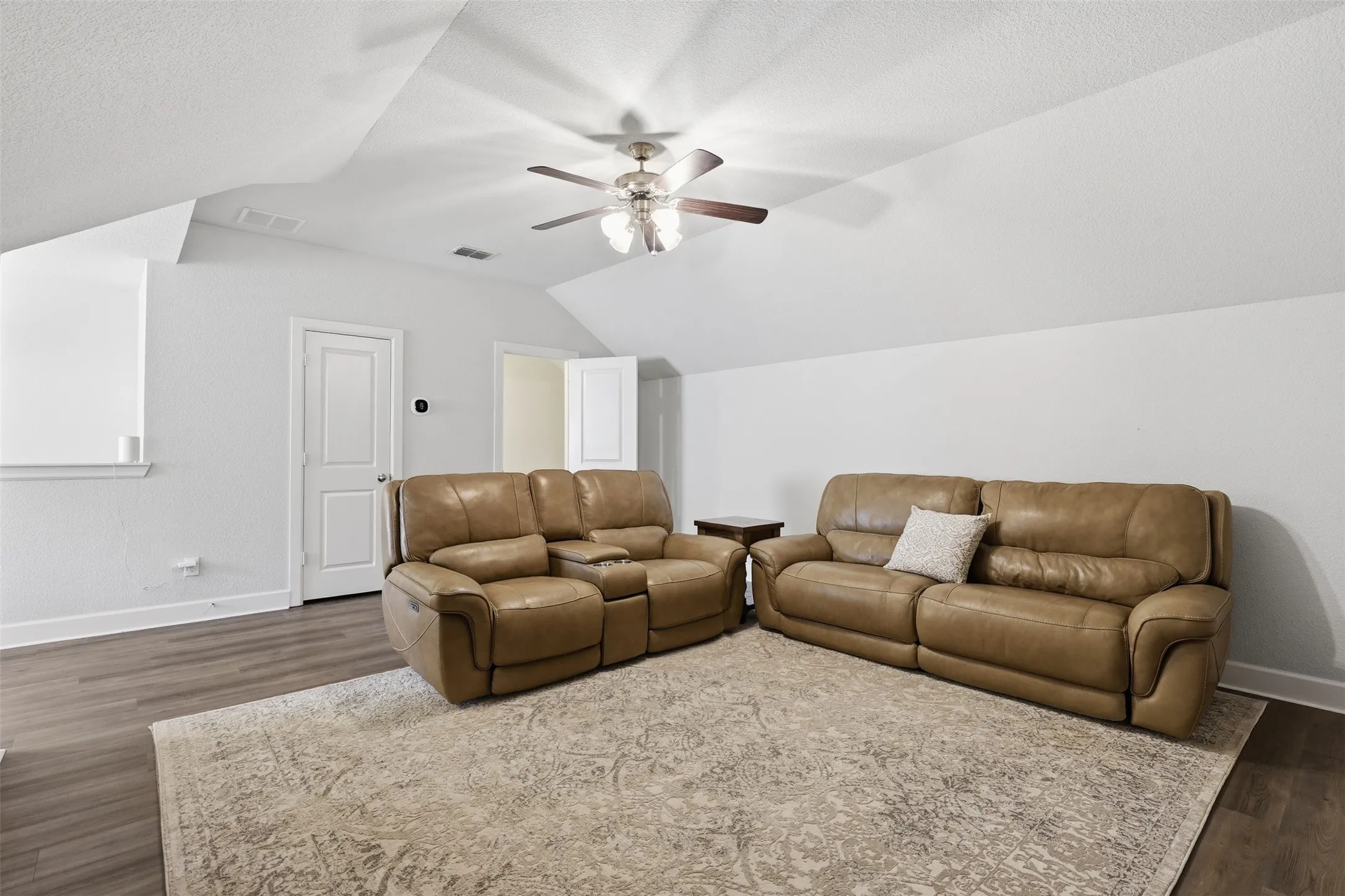 Huge Upstairs bonus room with Vaulted ceilings, half bath, closet and walk in attic. Great play room, media room or bedroom.
