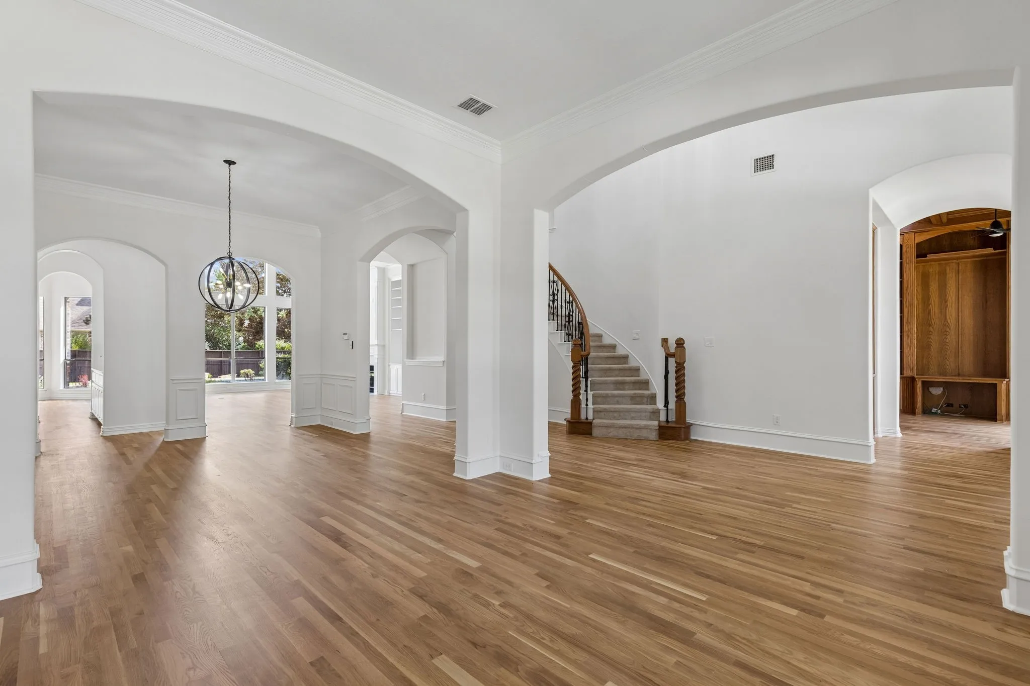 formal living and dining rooms provide polished spaces for hosting.