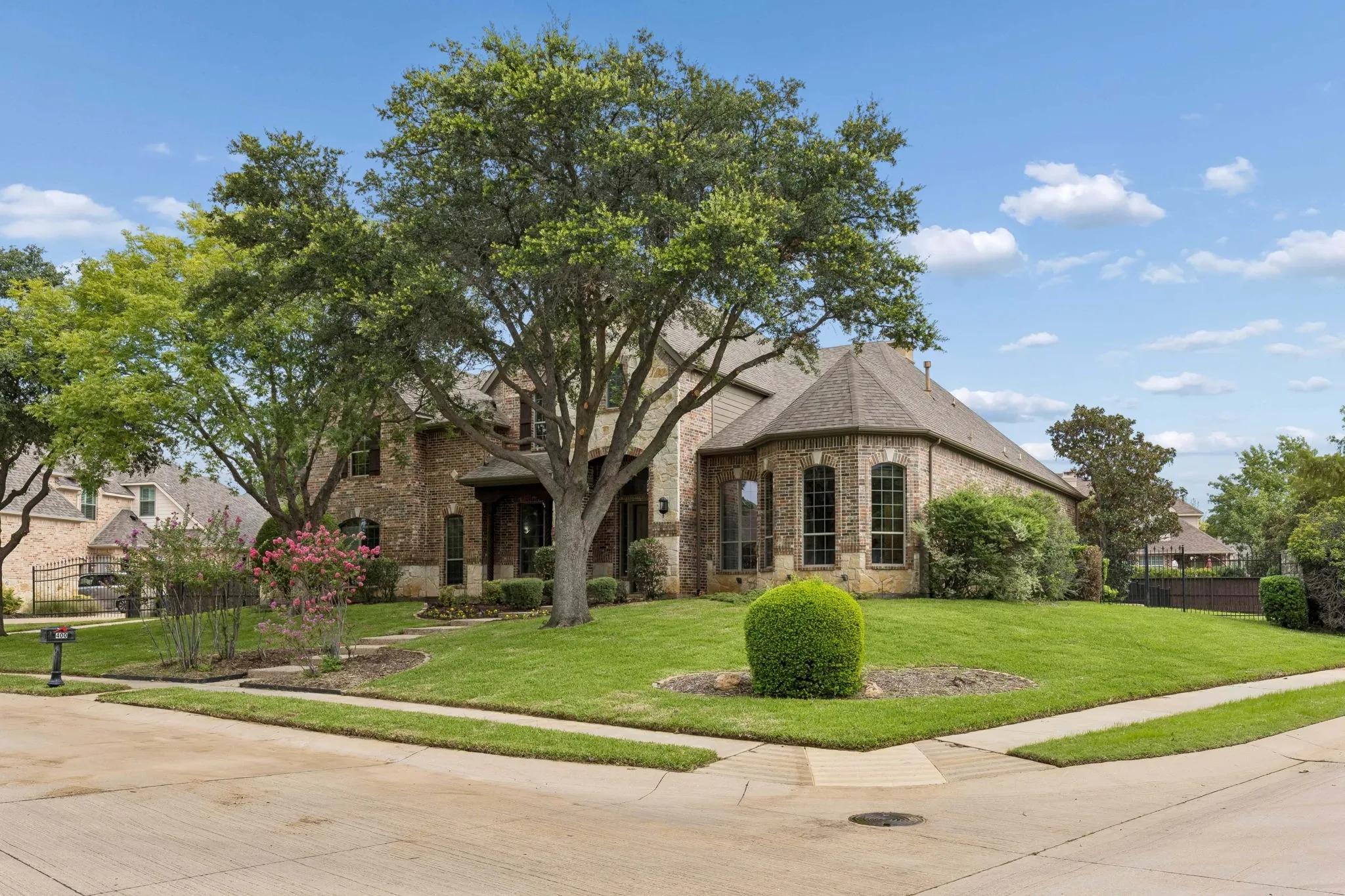Property is well appointed on a corner lot.