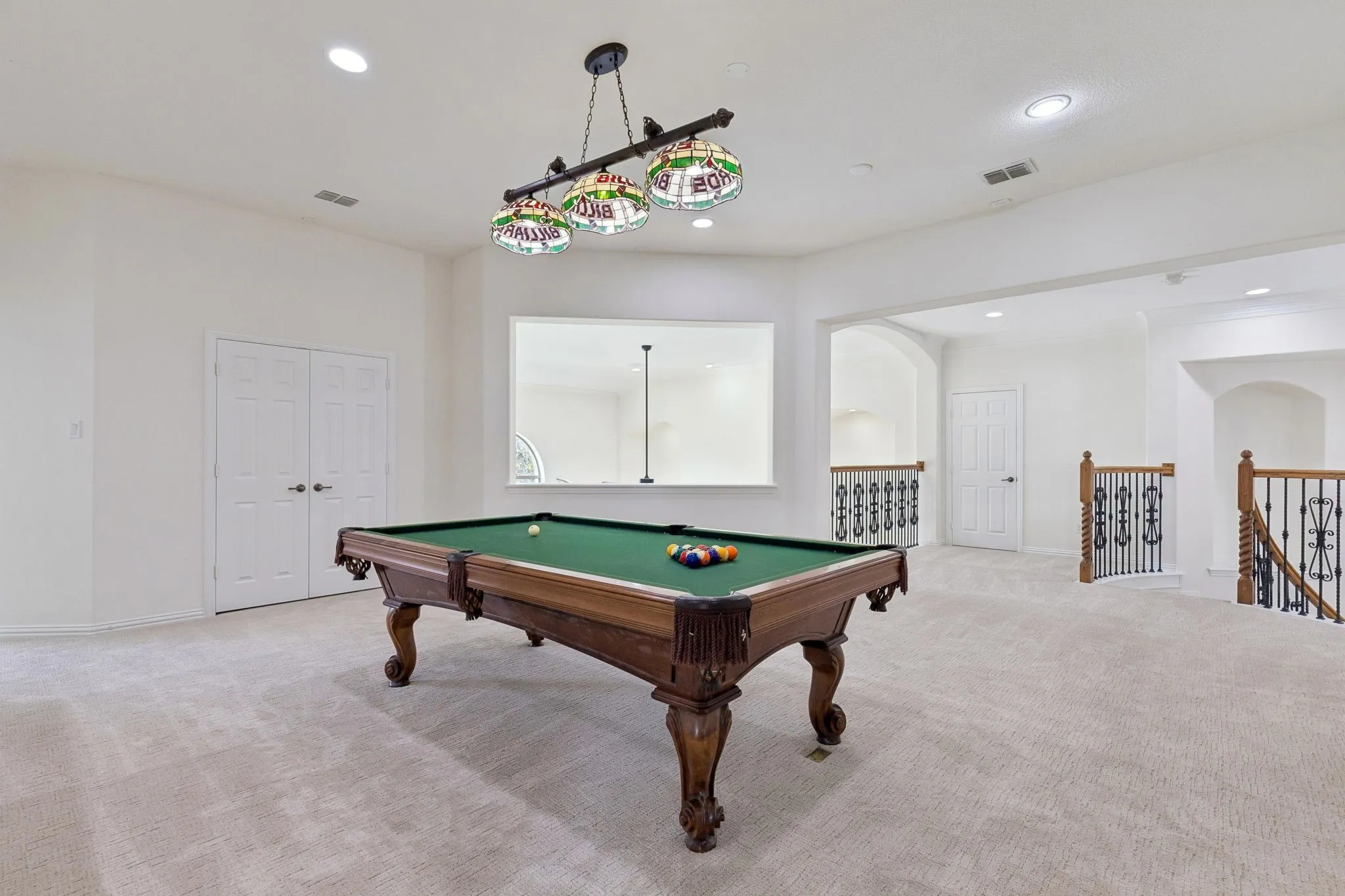 Loft style game room is up and services 3 additional bedrooms.