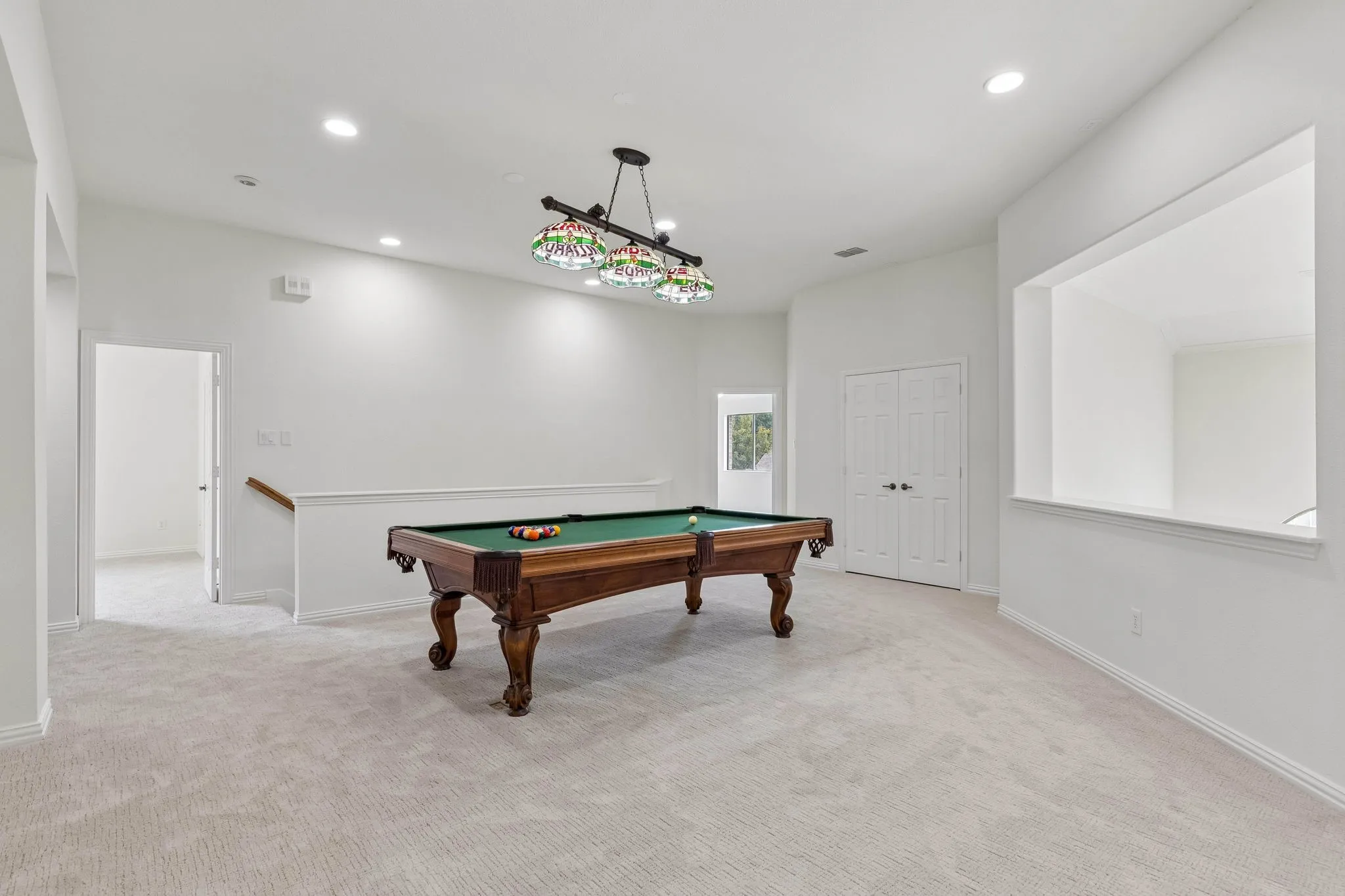 Game room is spacious, open and versatile.