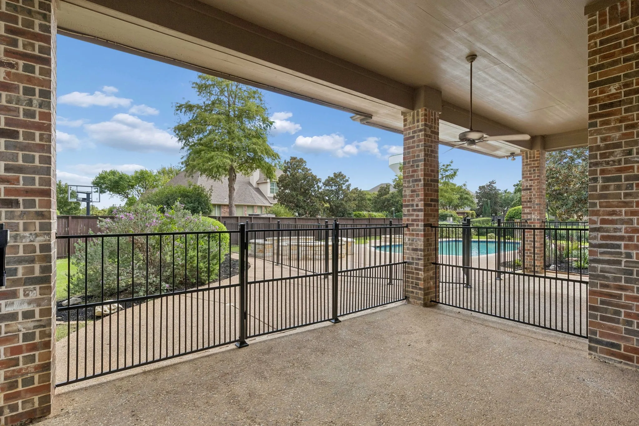 Back covered patio lets you bring the enjoyment outside no matter the weather.