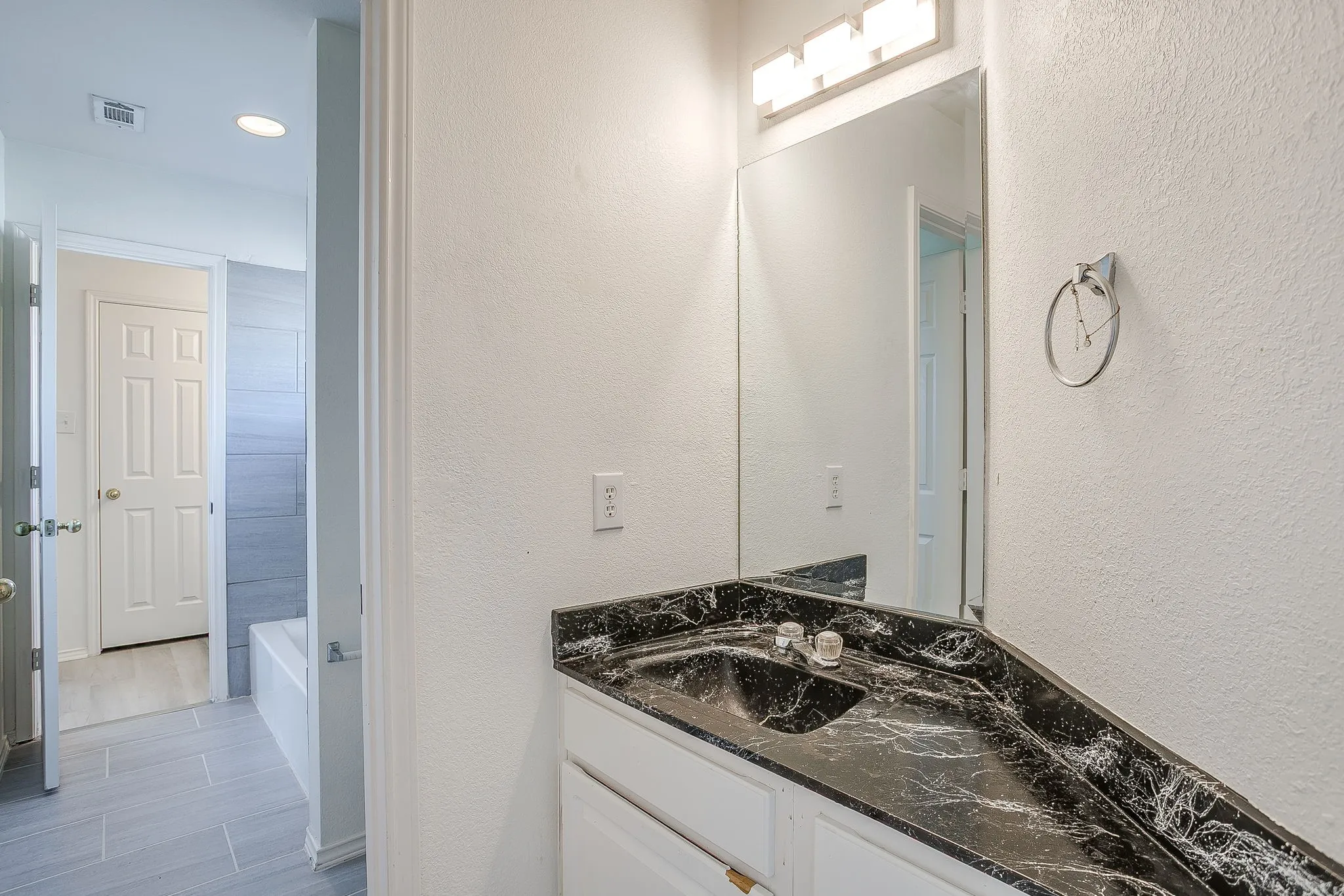 Separate sink in Jack & Jill bathroom