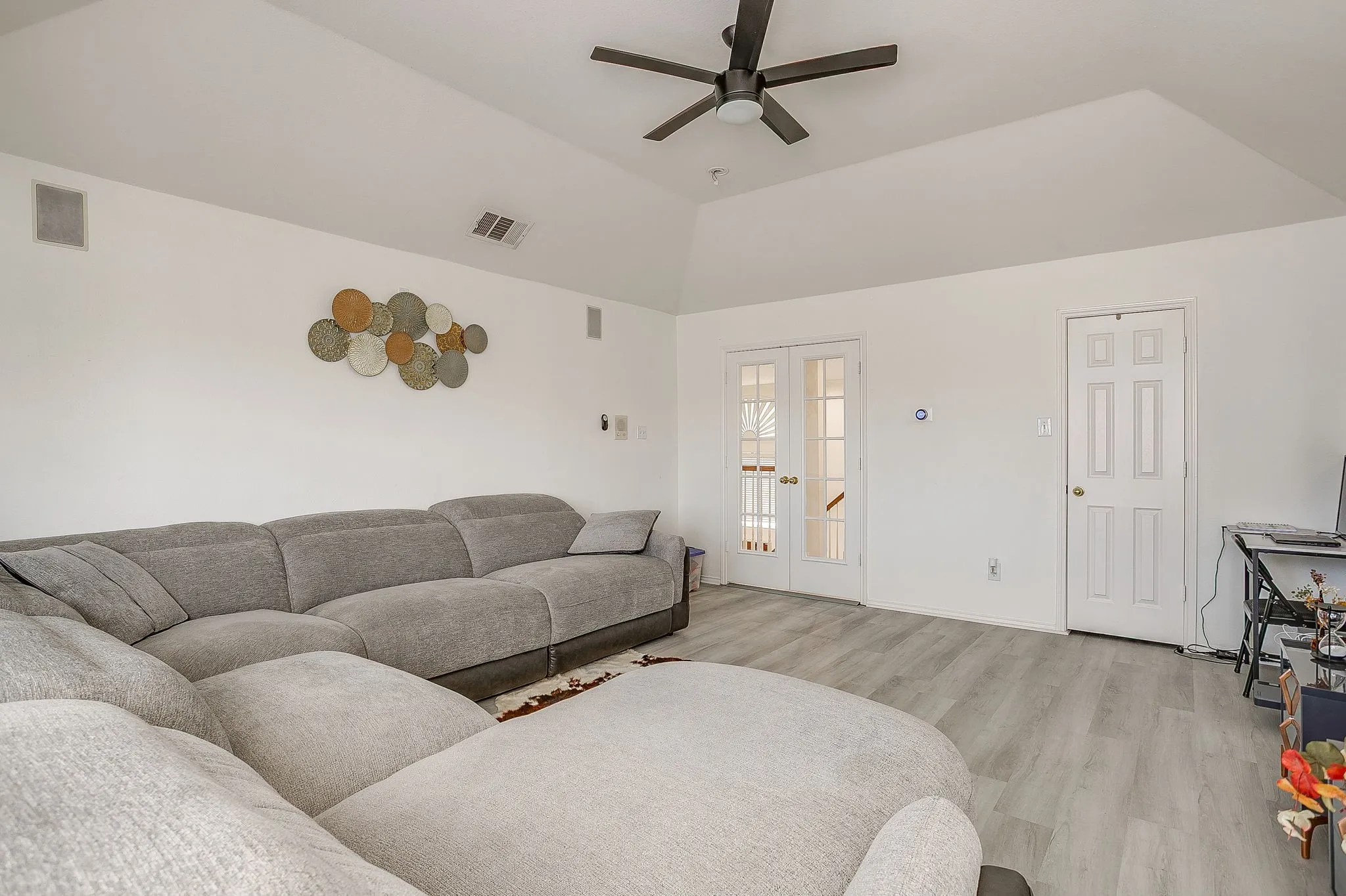 Bedroom #2. Access to hall bathroom. Vaulted ceiling.