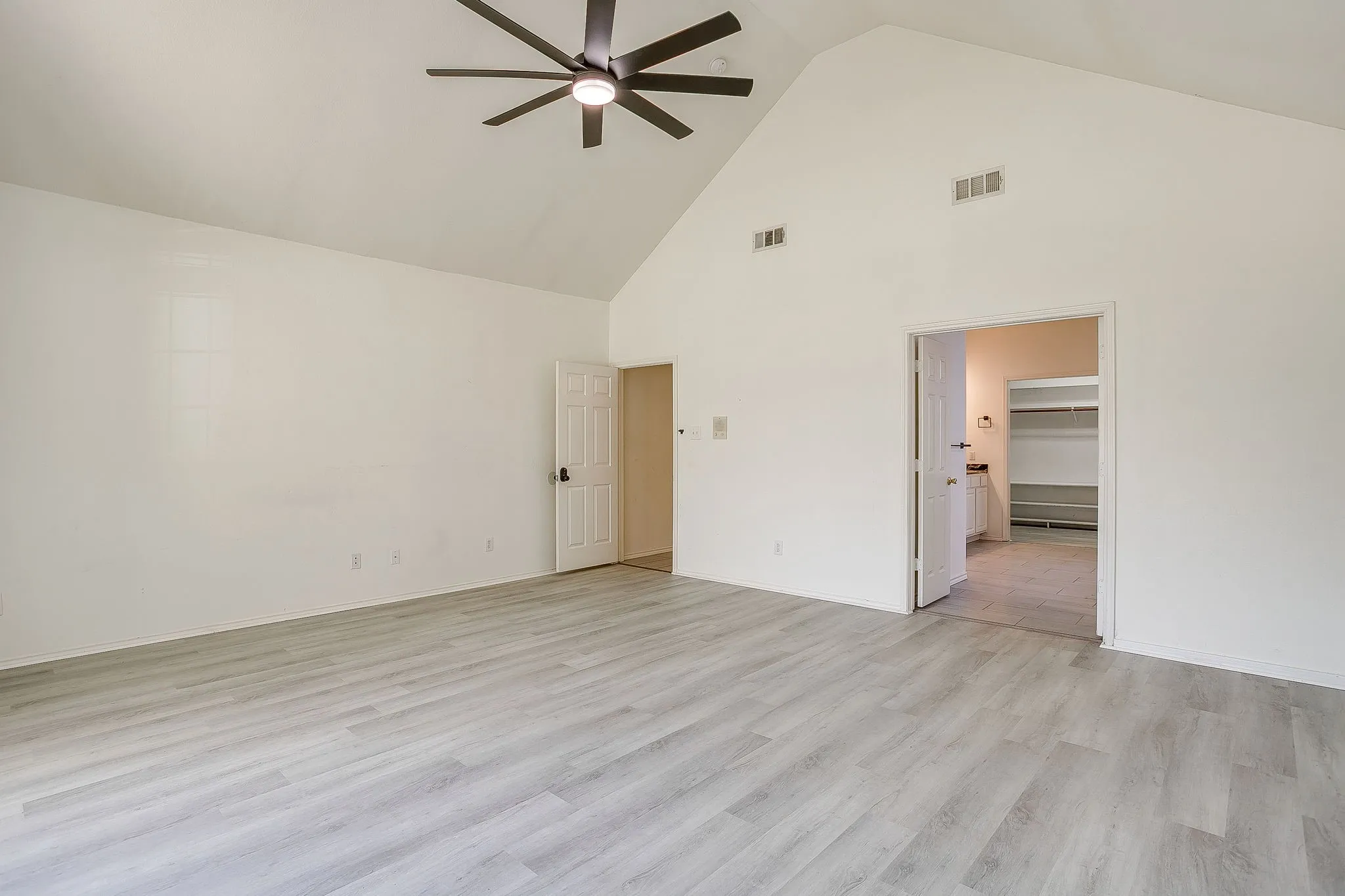Tile flooring, double sinks and large walk in closet.