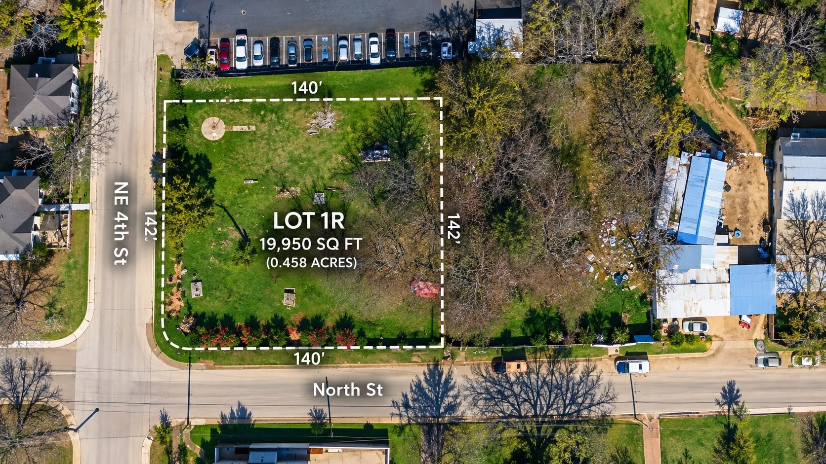 Corner lot spanning 19,950 square feet with established trees and direct street access