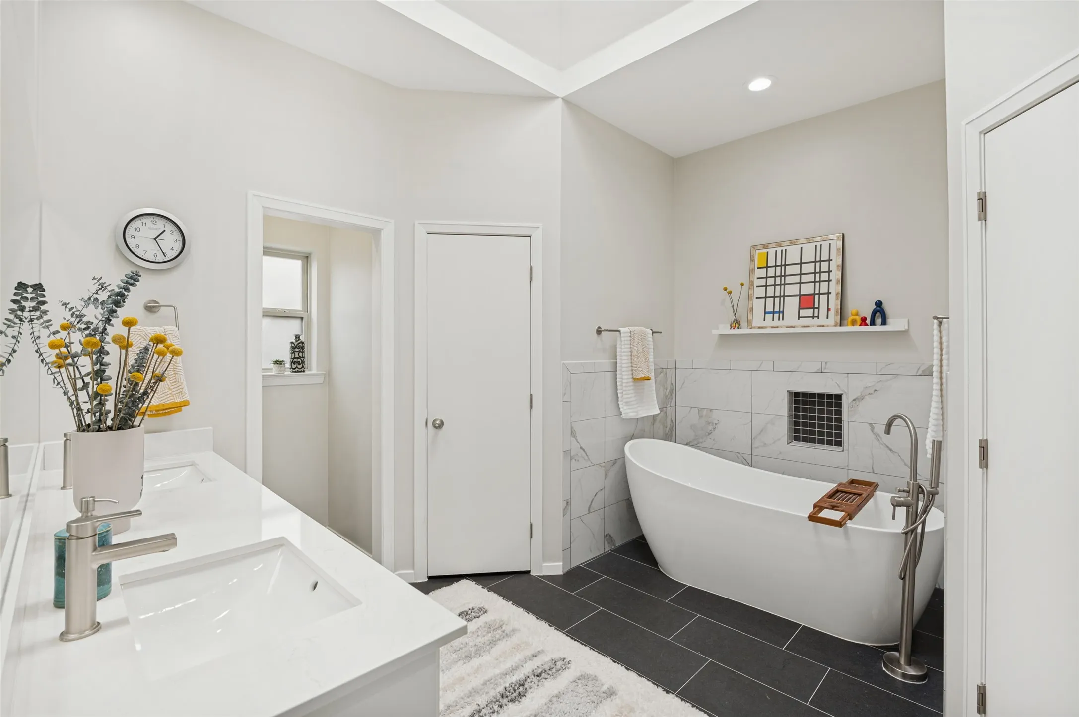 Primary ensuite bathroom with free standing bathtub
