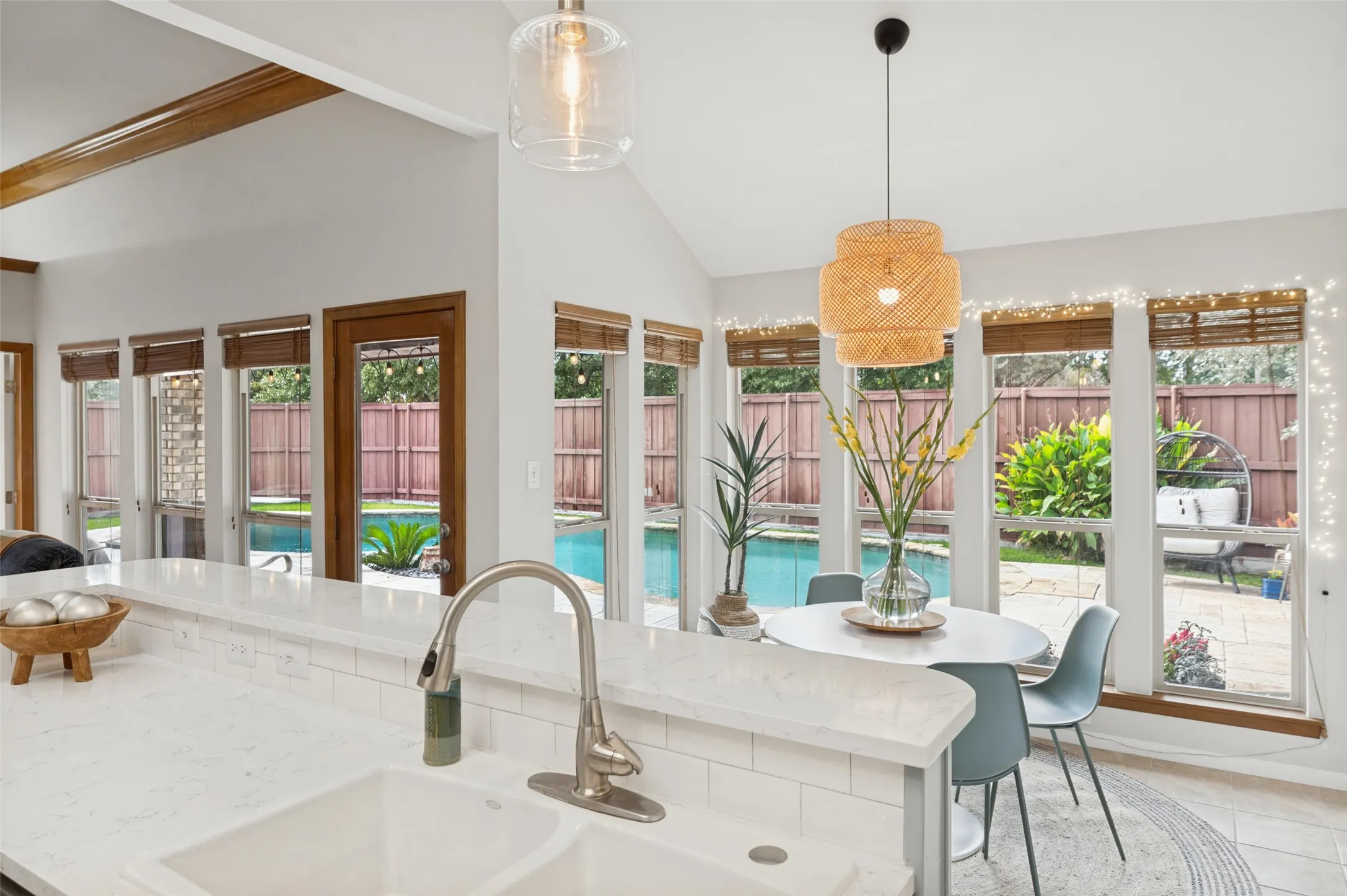 Enjoy the view of the pool area while cooking