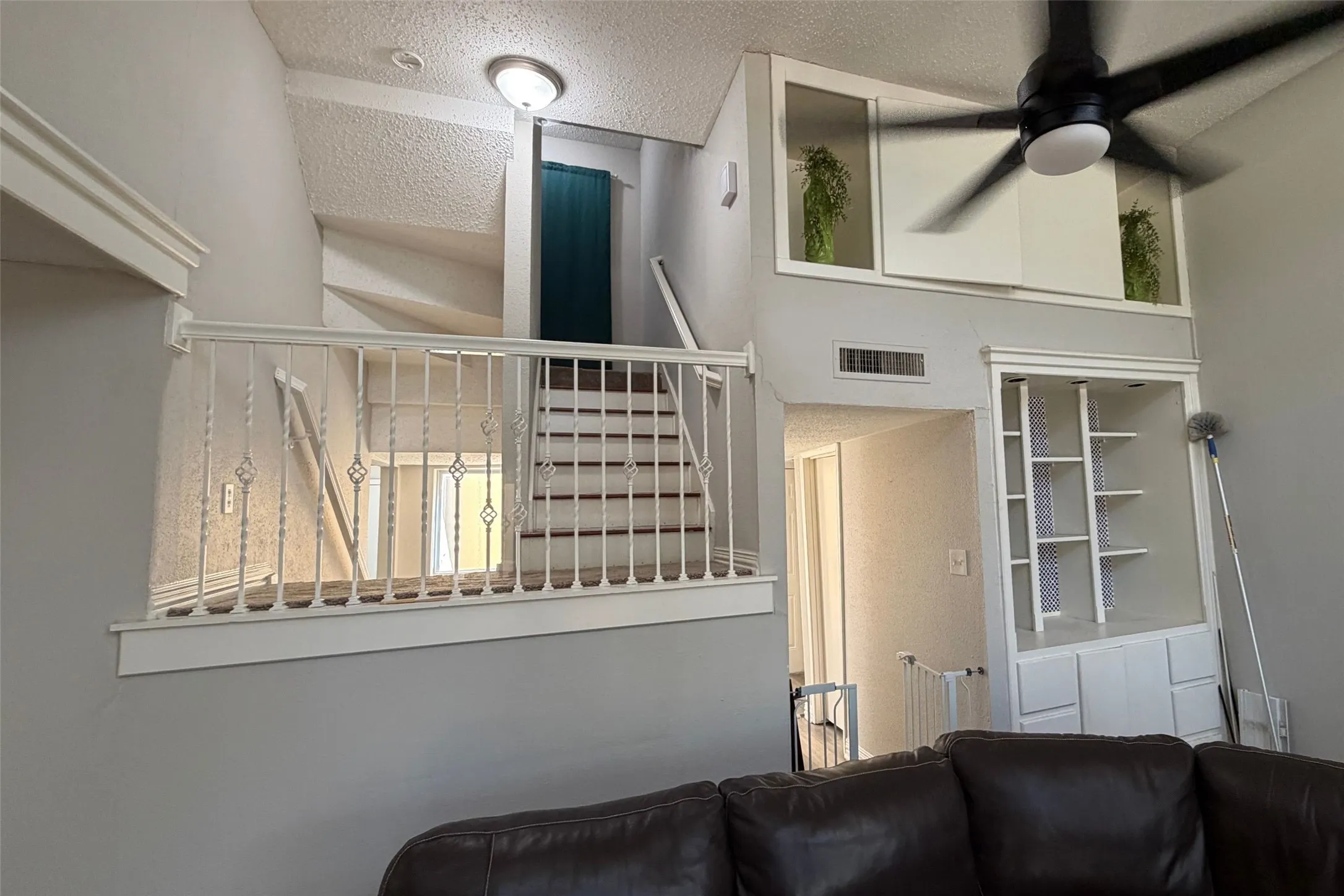 Living Room Facing Stairs to Second Level