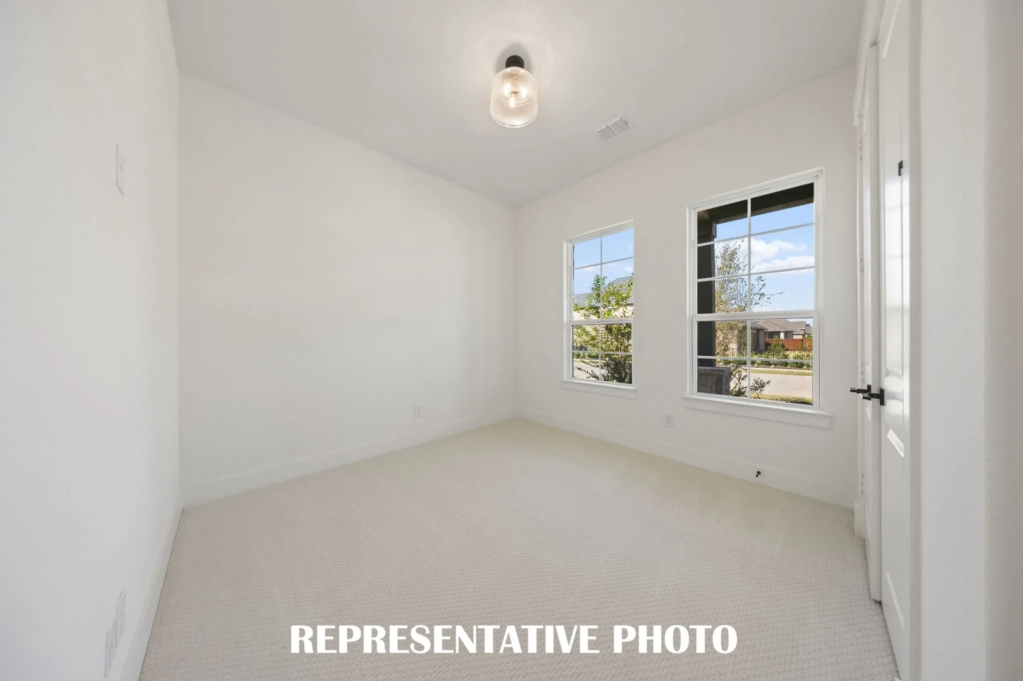 You'll find nicely sized secondary bedrooms in our Cathy floor plan.  REPRESENTATIVE PHOTO