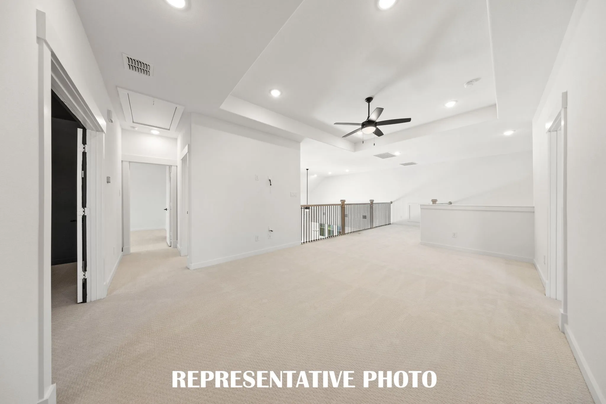 Light and bright, the family will love getting together for game night in this wonderful game room!  REPRESENTATIVE PHOTO