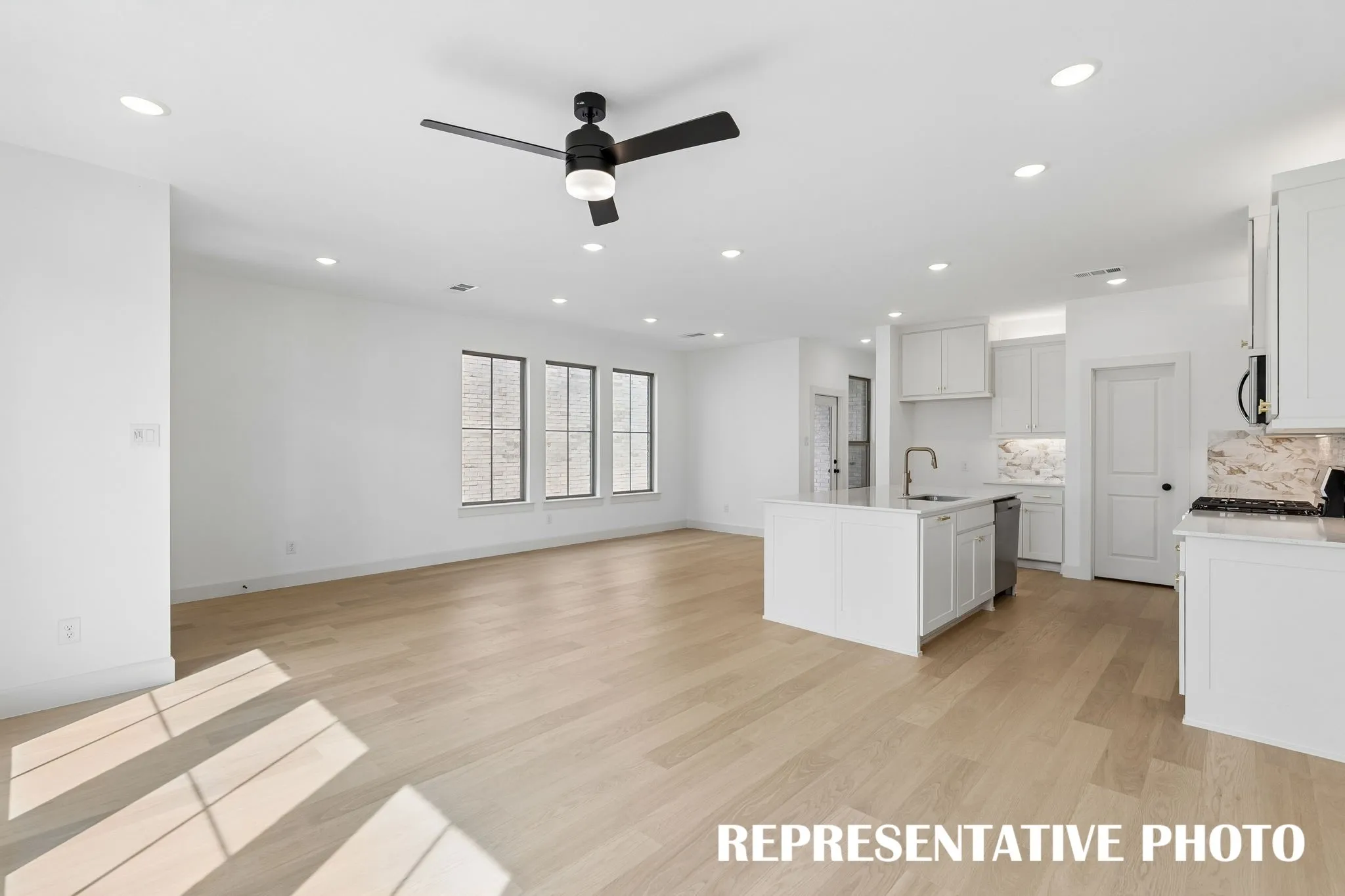 Open and flowing, our Audrey plan was designed for entertaining.  REPRESENTATIVE PHOTO