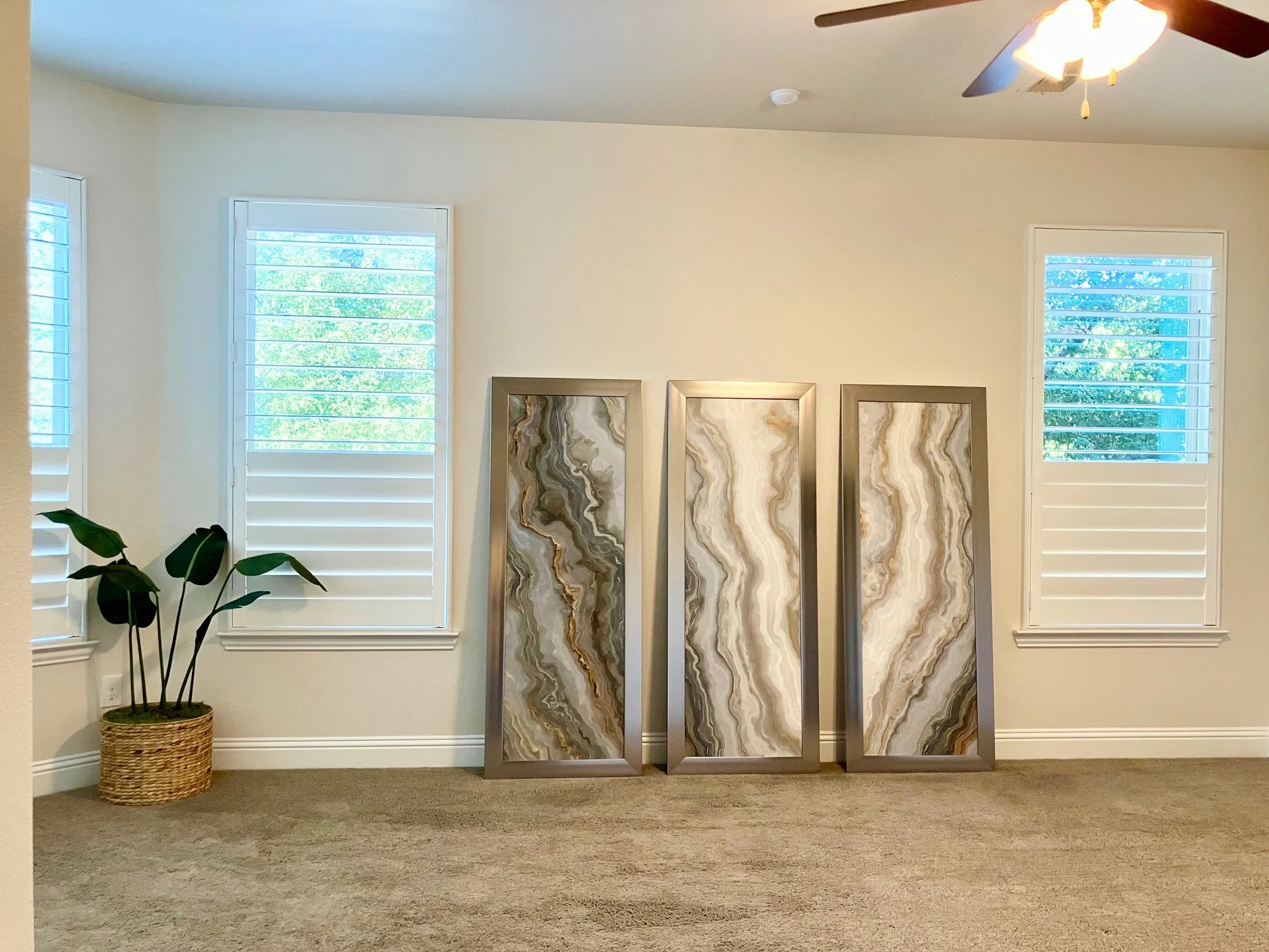 Partial view of the main bedroom suite downstairs, custom extra-wide shutters
