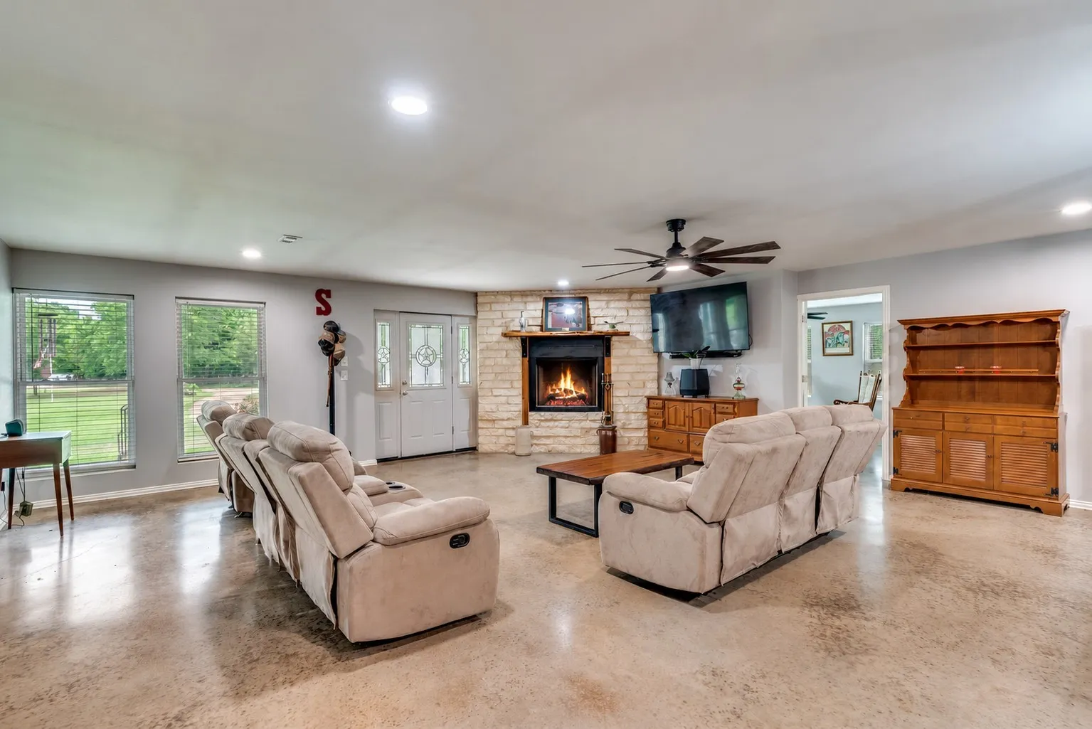Spacious living room with wood burning fireplace!