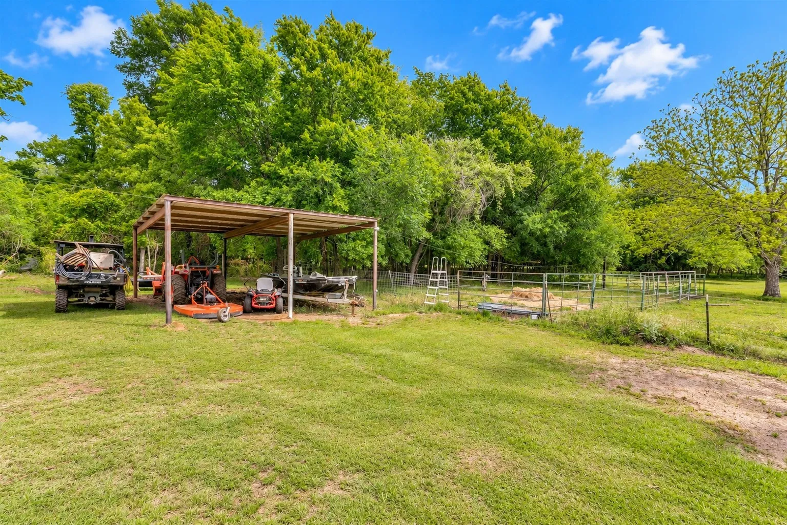 Another carport-covered area