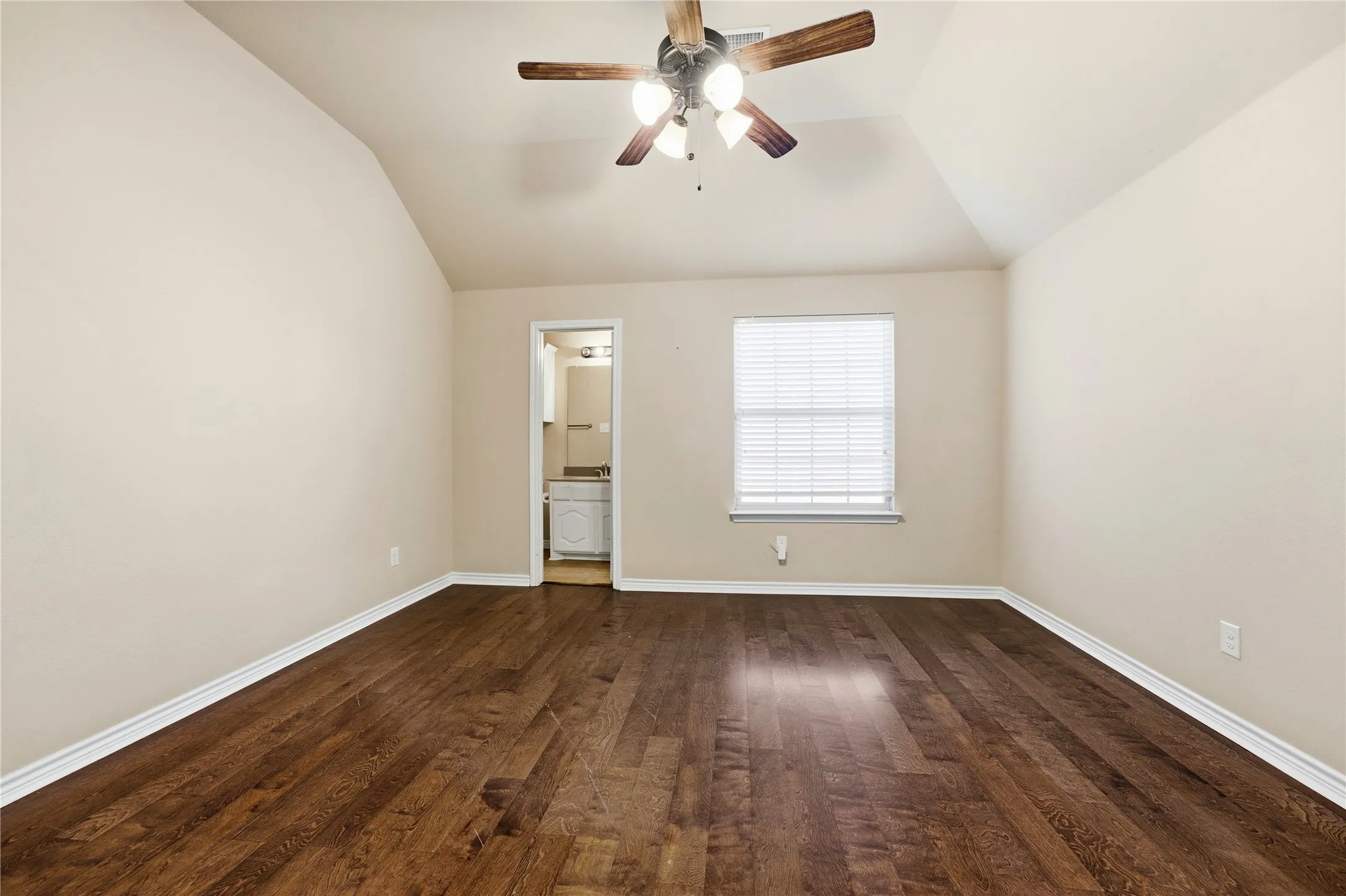 Spacious upstairs bedroom with walk in closet, and en-suit connected.