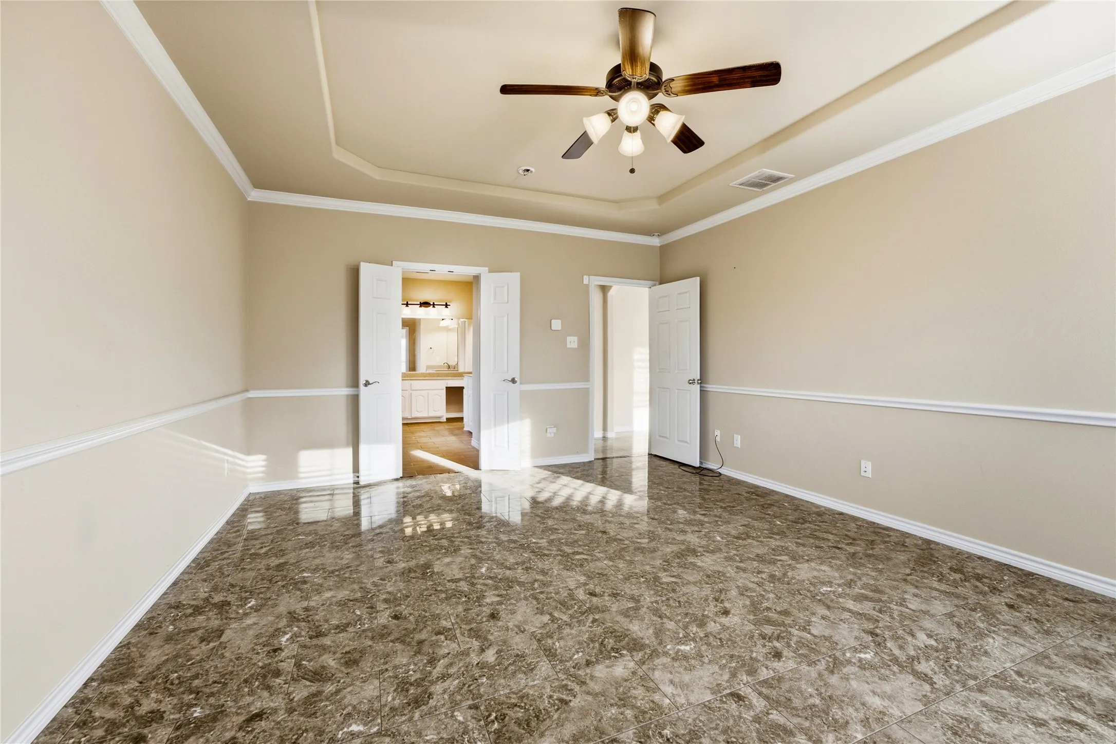A spacious primary suite designed for comfort, relaxation, and everyday luxury.