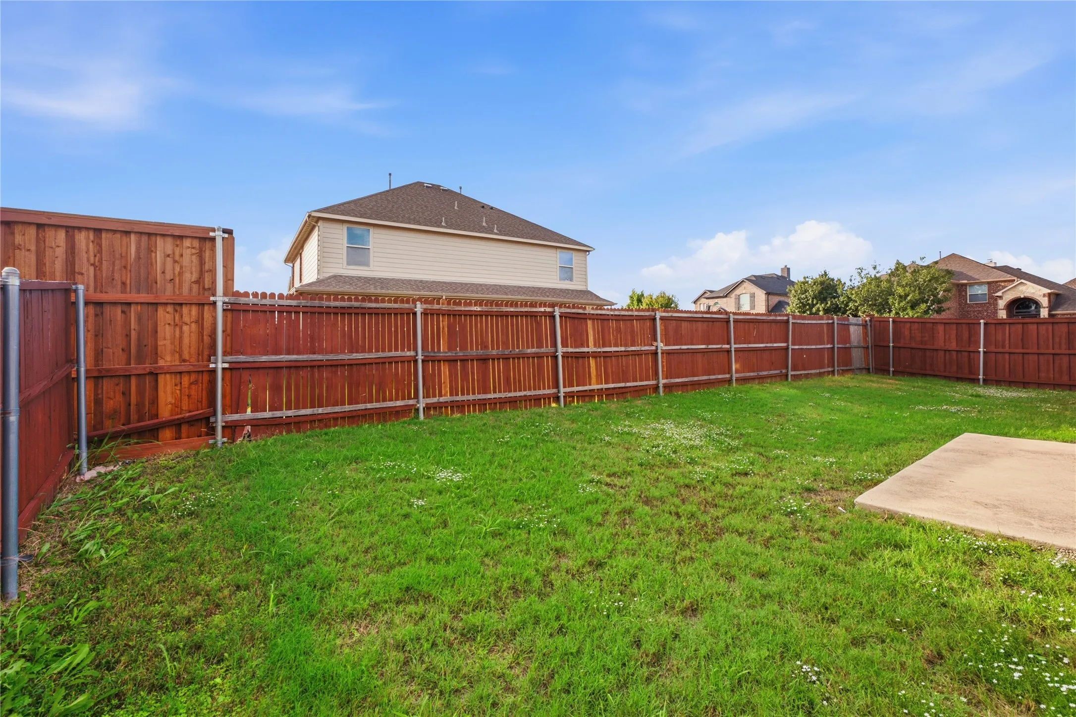 Step outside to a generous backyard with privacy and endless possibilities to make the space your own!